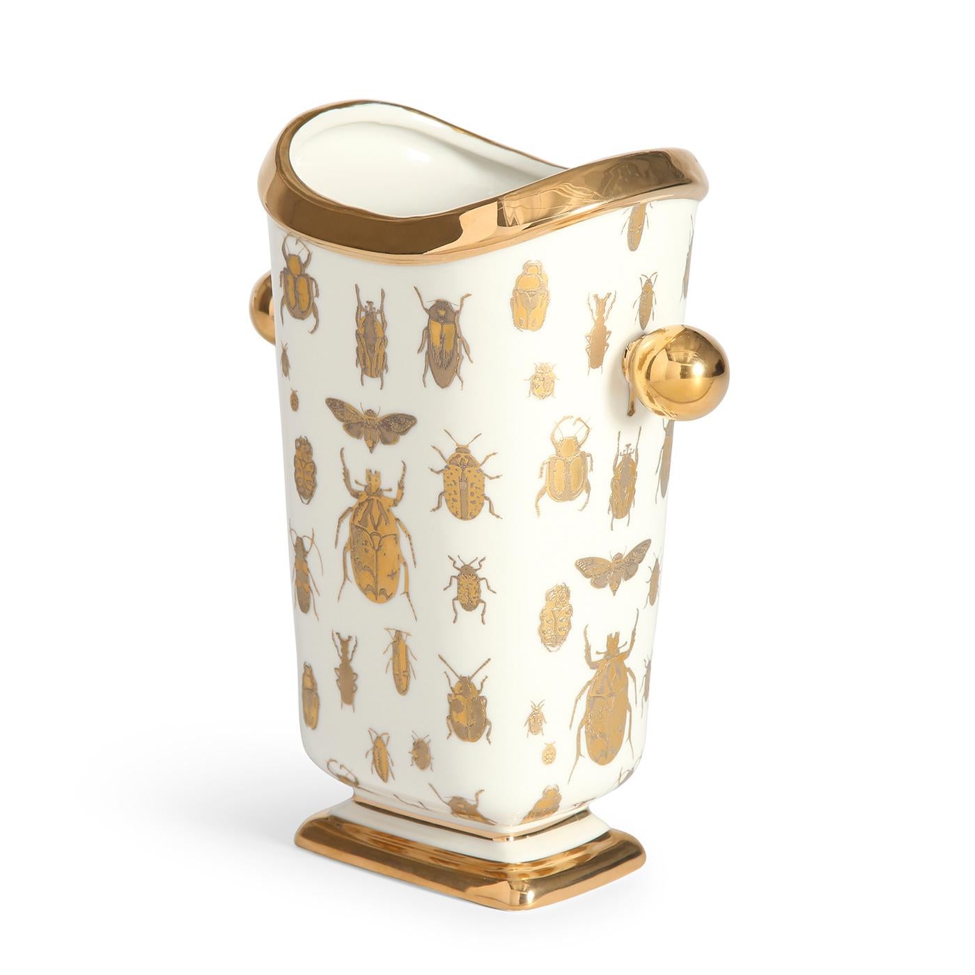 Natural selections. Observe the science of chic. Limited-quantity editions, our Botanist vessels elevate your everyday look at leaf and wing. Glossy high-fired porcelain wrapped in shimmering gold silhouettes, our specimen vase is the perfect rich