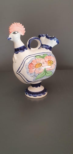 Botijo, pipo or bucaro in the shape of a chicken, glazed ceramic.