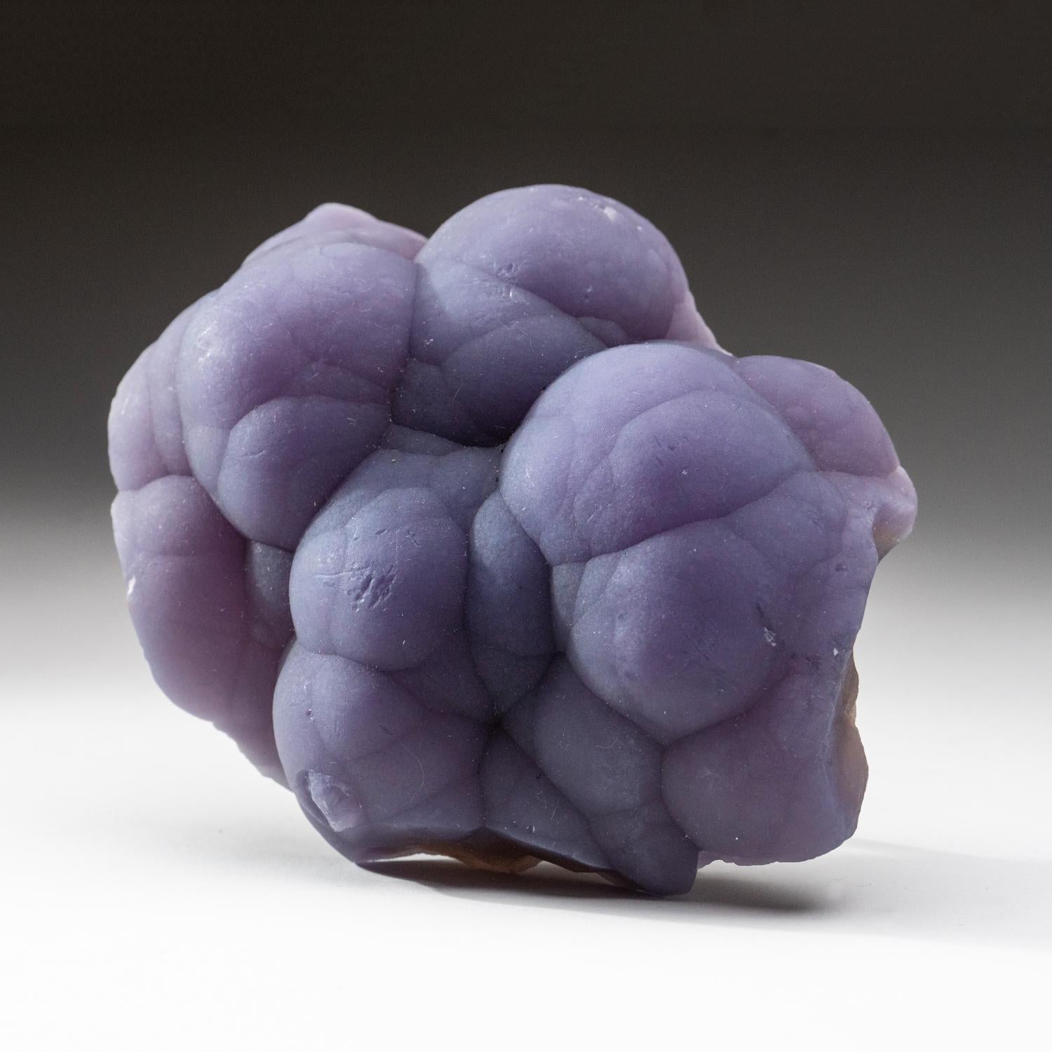 From Minggang Mine, Xinyang Prefecture, Henan, China Translucent purple fluorite in botryoidal formation with sculptural hemispherical aggregates covering both sides of its matrix. This unique specimen is sure to be a standout addition to any