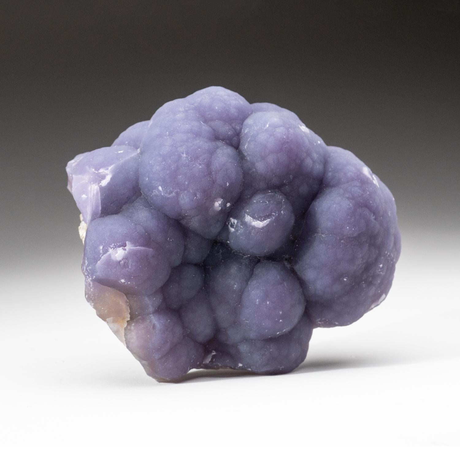 From Minggang Mine, Xinyang Prefecture, Henan, China Translucent purple fluorite in botryoidal formation with sculptural hemispherical aggregates covering both sides of its matrix. This fluorite is unique and attractive, featuring a lustrous sheen