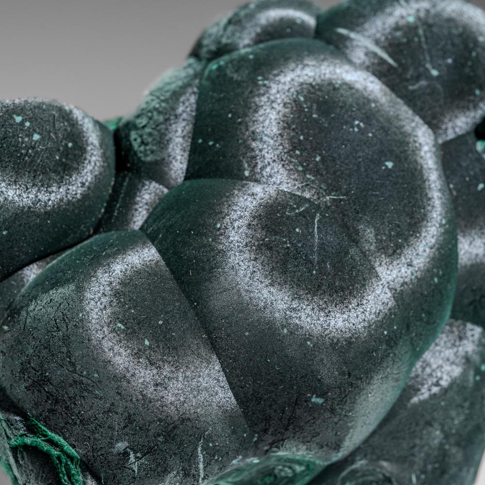 From Shaba Copper Belt, Katanga (Shaba) Province, Democratic Republic of the Congo (Zaire) A sculptural botryoidal formation of solid velvety green malachite from the famous copper mines of Shaba. Beautiful lustrous even green color all throughout