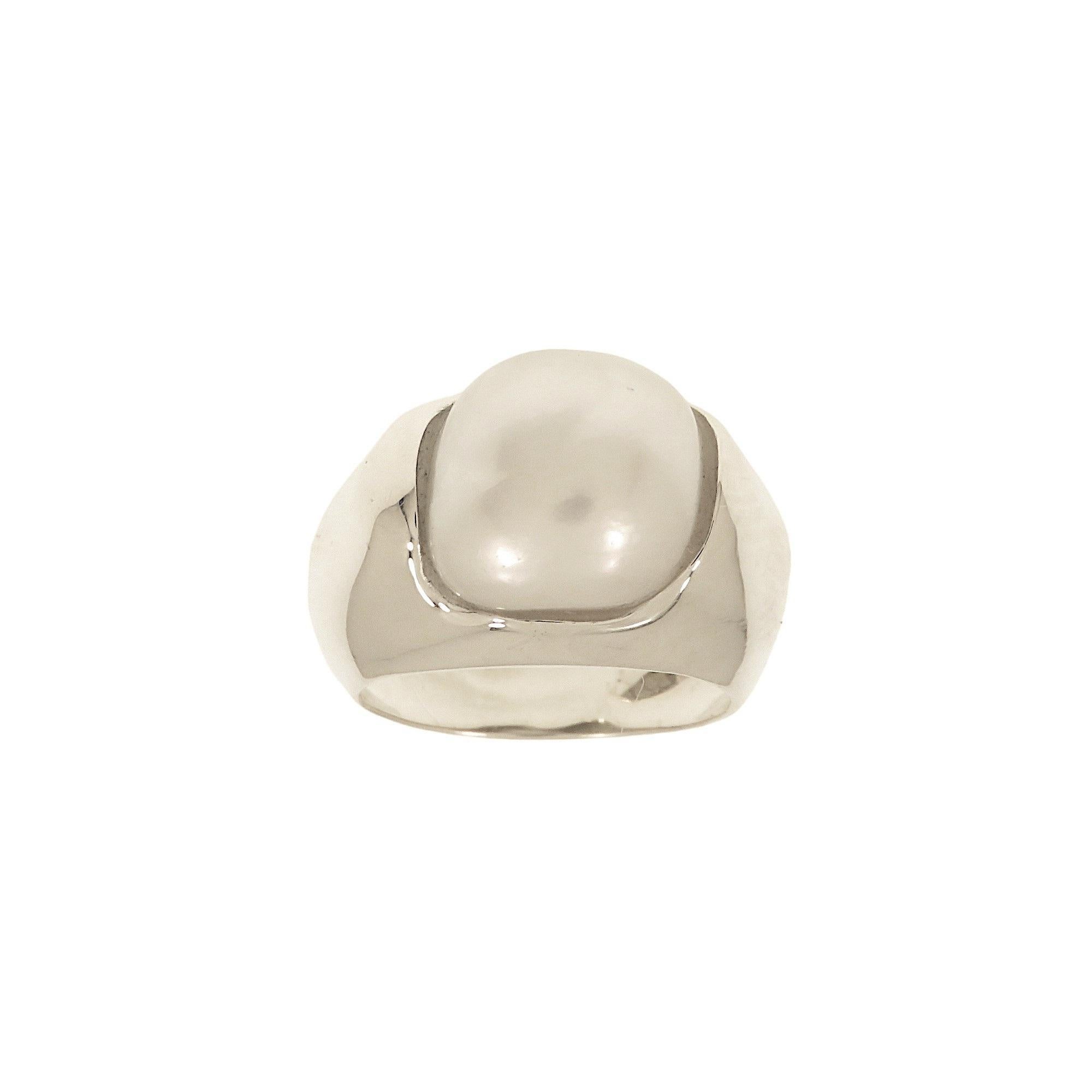 Refined 9k white gold ring made to harmoniously encircle a stunning Australian Baroque pearl measuring 14x12 mm / 0.55x0.47 inches for a weight of 13 carats.  The pearl grown in Australia has an extraordinarily beautiful silver-white color and is