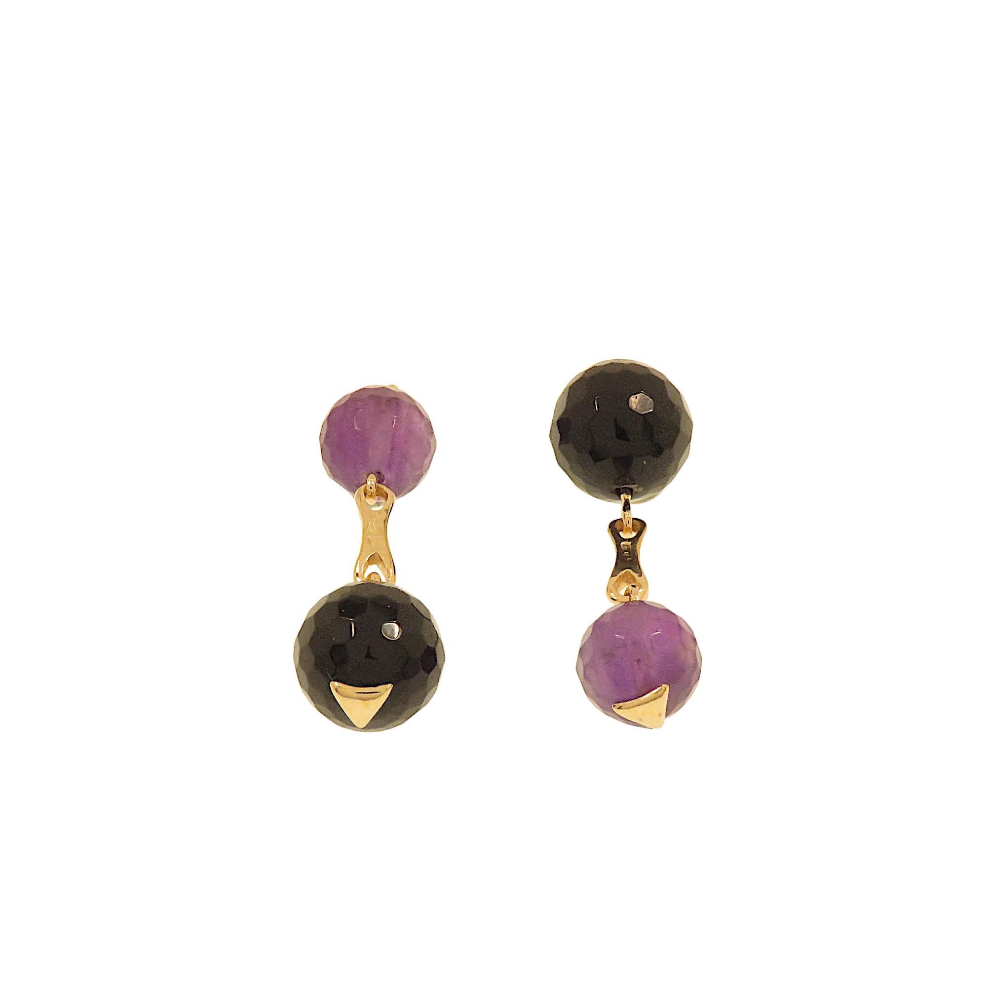 Elegant minimalist cufflinks created by hand in 9k rose gold with onyx and amethyst. The combination of colors and choice of stones make these jewels whimsical and unique. They were made in our goldsmith's workshop in Milan by expert hands and