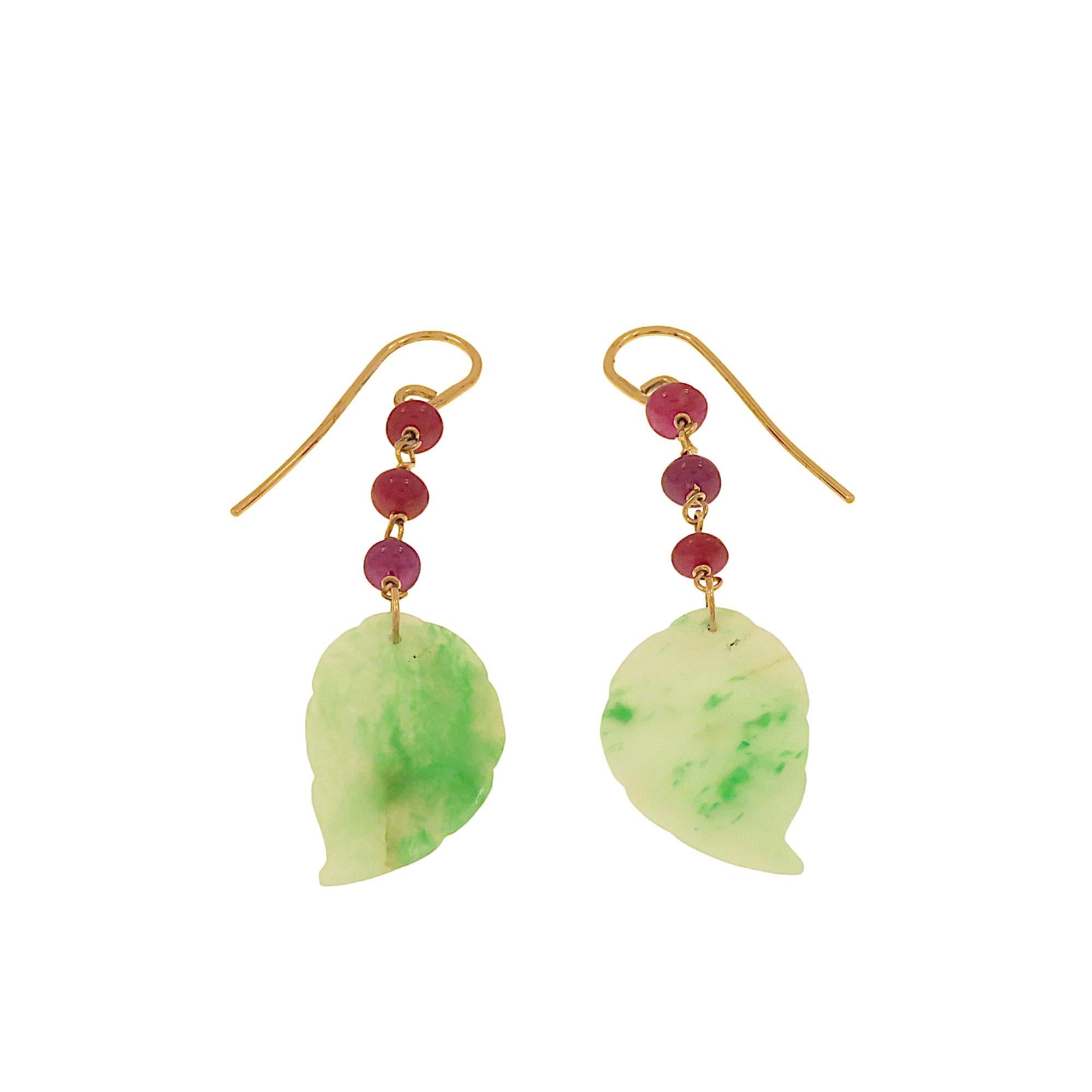 Original 9k rose gold earrings with nugget-cut rubies and leaf-cut and engraved green imperial jade. The earrings are handmade by Botta Gioielli in its workshop in Milan Italy. Each elegantly beautiful jade leaf measures 28x16 mm / 1.10x0.63 inches.