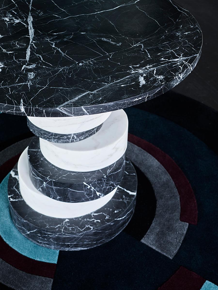 The playful asymmetry and alternating monochrome marble discs of its base make Botta as much a style statement as a beautiful side table.

 

Botta is hewn from solid pieces of Nero and Bianco marble. Whether it’s supporting a lamp, sculpture,