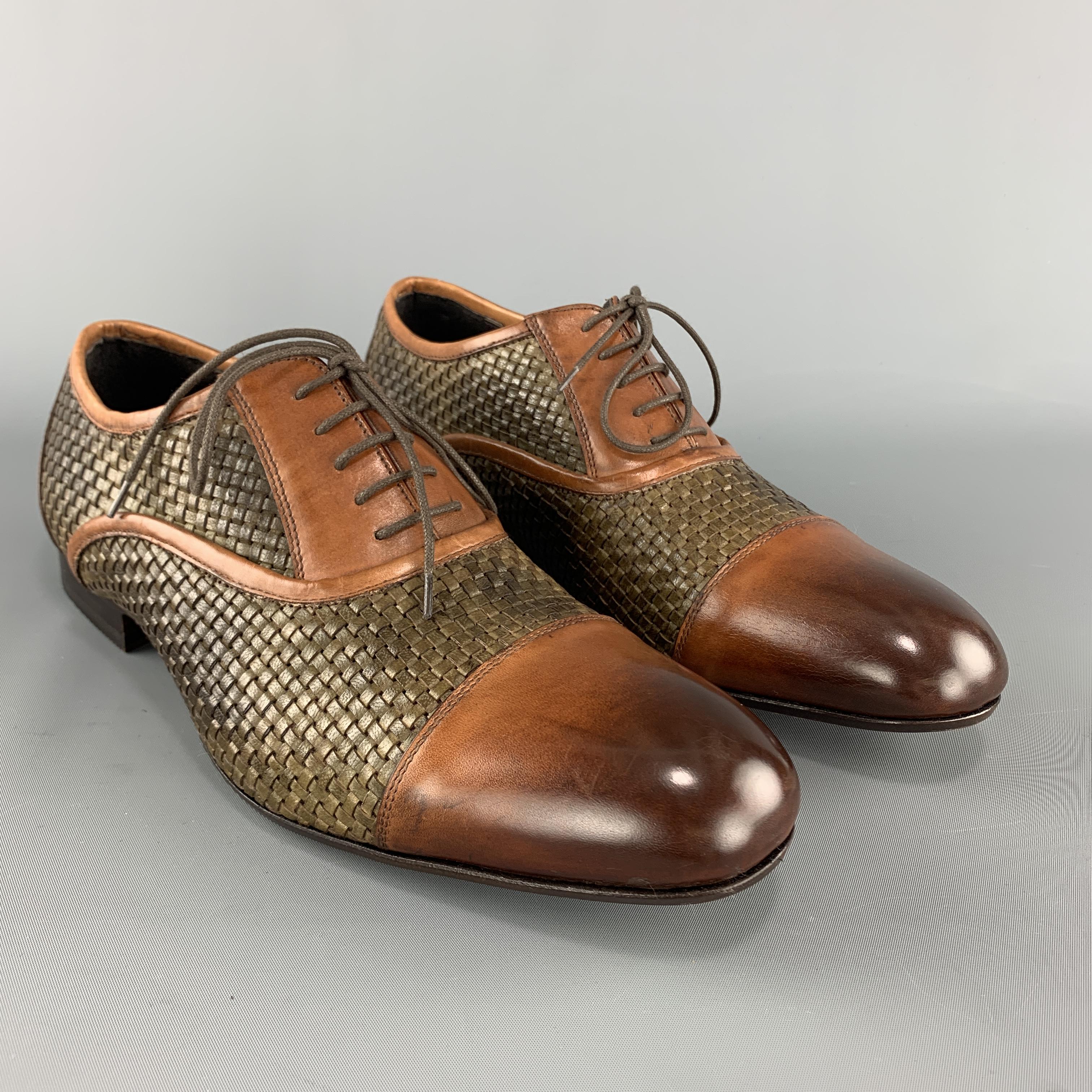 BOTTEGA ITALIANA dress shoes come in brown woven leather with tan antique effect leather cap toe and piping. Made in Italy.

Brand New.
Marked: IT 43

Outsole: 12 x 4 in.