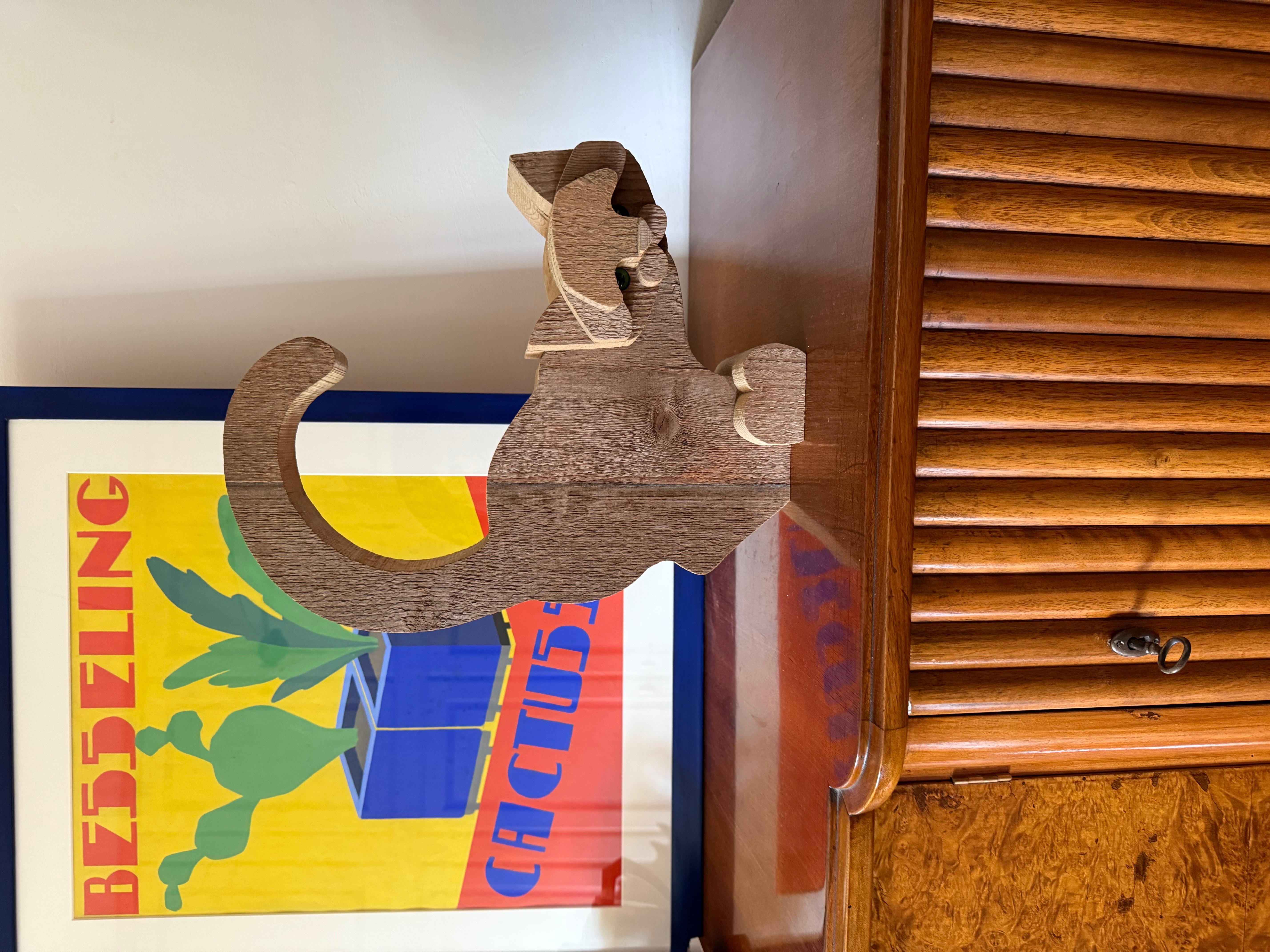 Cat wood sculpture

Bottega Michelangeli, Orvieto Italy 1970s

composed of assembled wooden sections, bear on the back manufacture's firebrand stamp and numbering,

H cm 38 × 33 × 12

Conditions: very good conditions consistent with age and use.