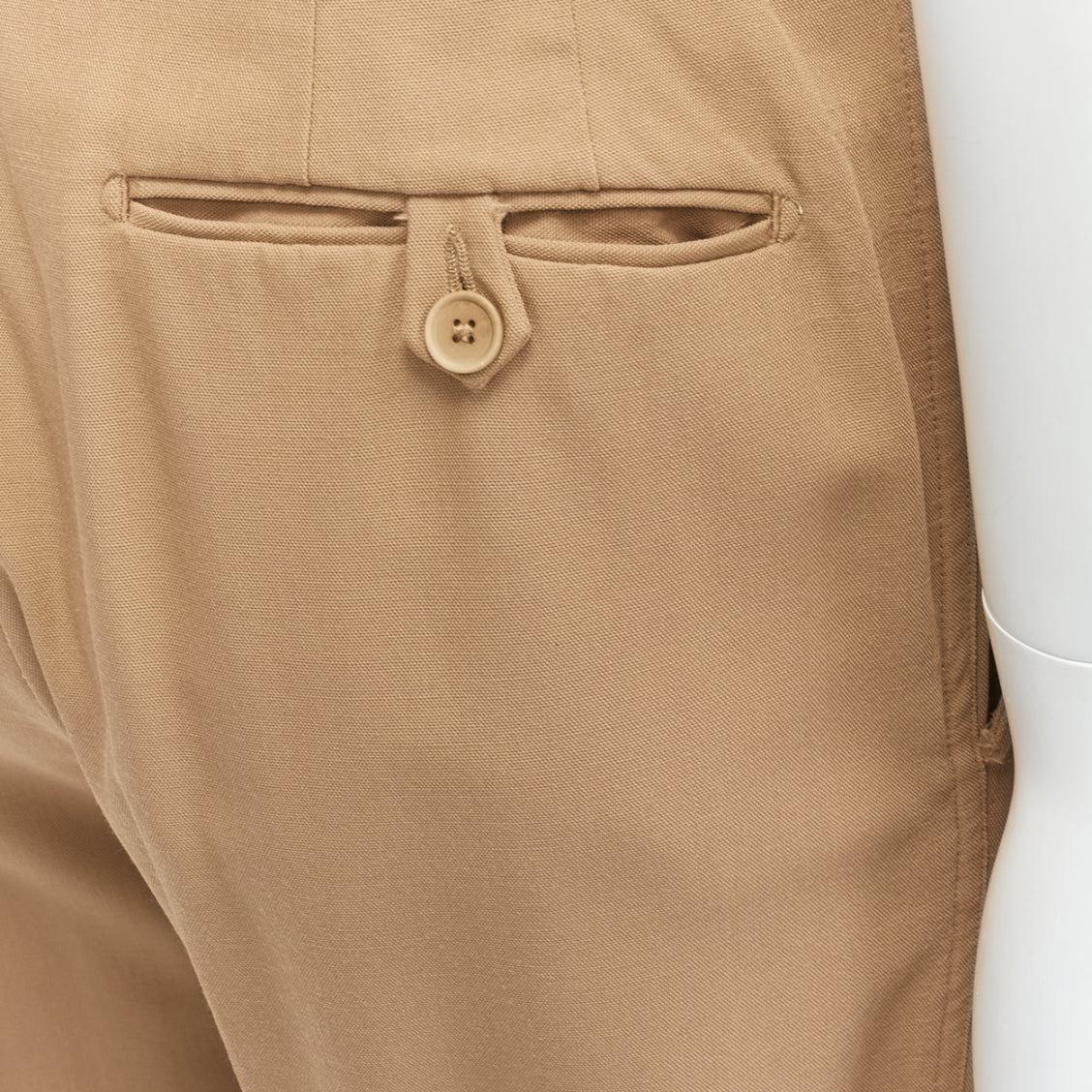 BOTTEGA VENETA 100% wool tan brown cotton lined pleated front pants IT48 M
Reference: CNLE/A00282
Brand: Bottega Veneta
Designer: Tomas Maier
Material: Wool
Color: Brown
Pattern: Solid
Closure: Button Fly
Extra Details: 1 pocket at right back.