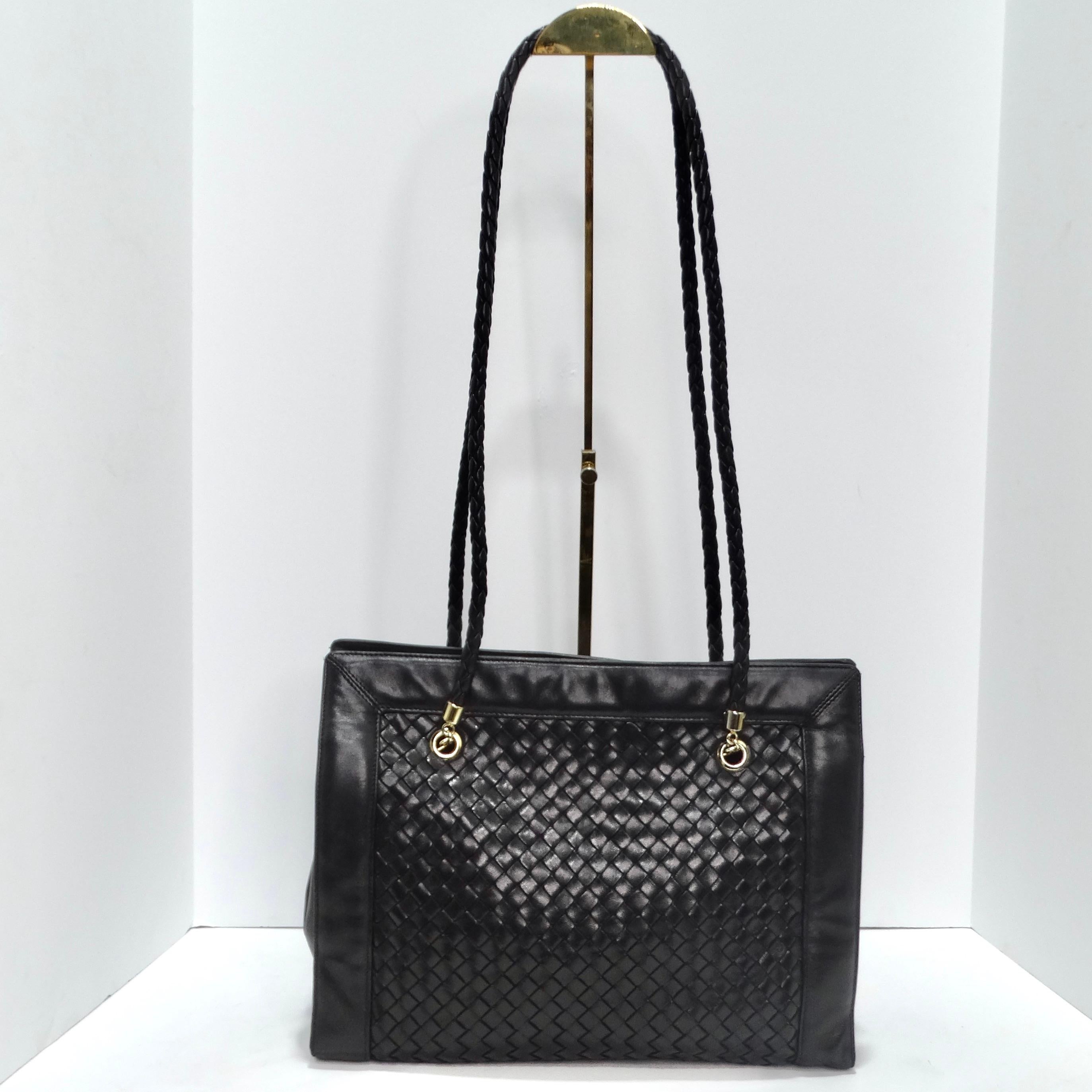 Get your hands on the Bottega Veneta 1980s Black Leather Woven Handbag – a classic and timeless accessory that effortlessly combines sophistication with the artisanal craftsmanship for which Bottega Veneta is renowned. This handbag is a testament to