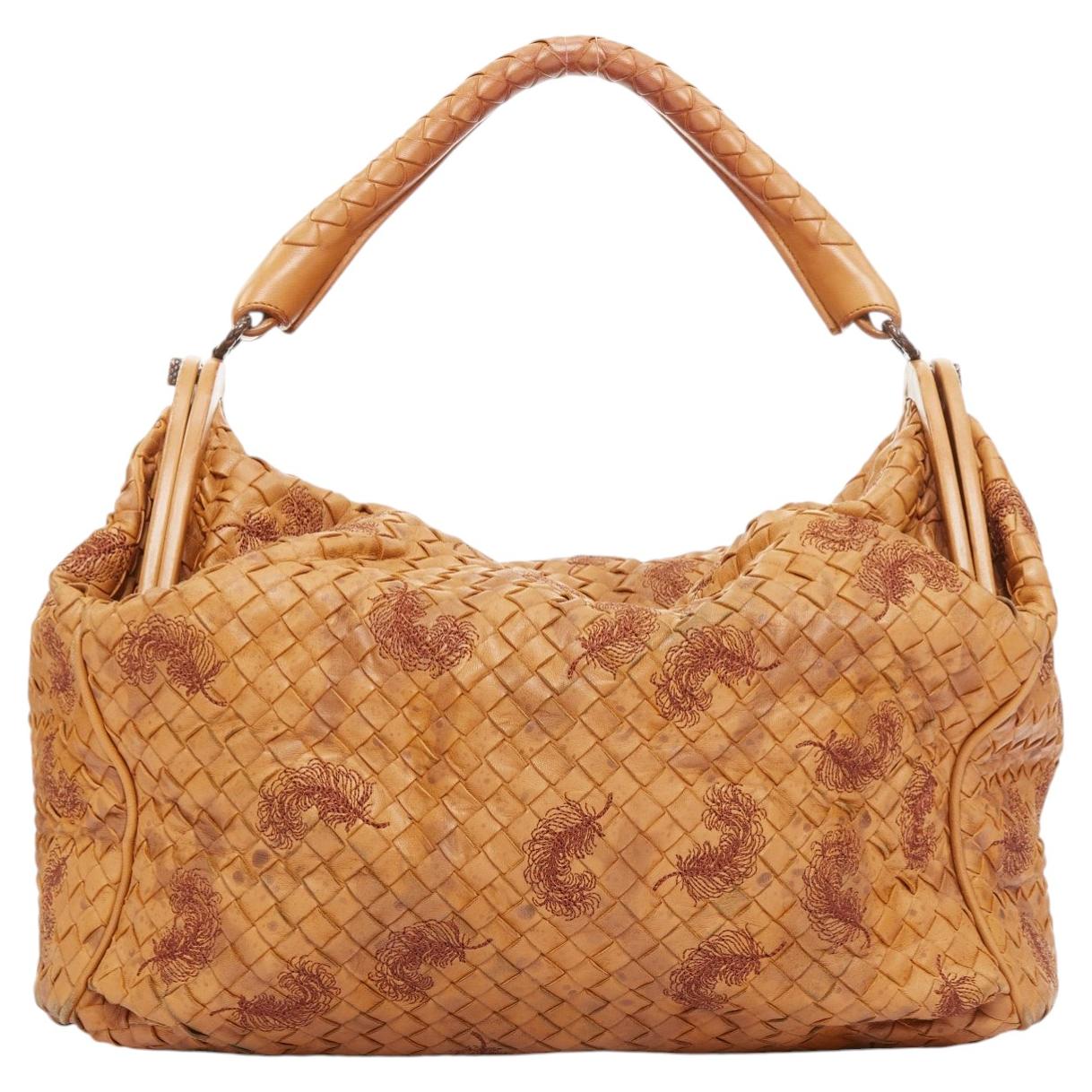 How do I clean Bottega Veneta leather?
