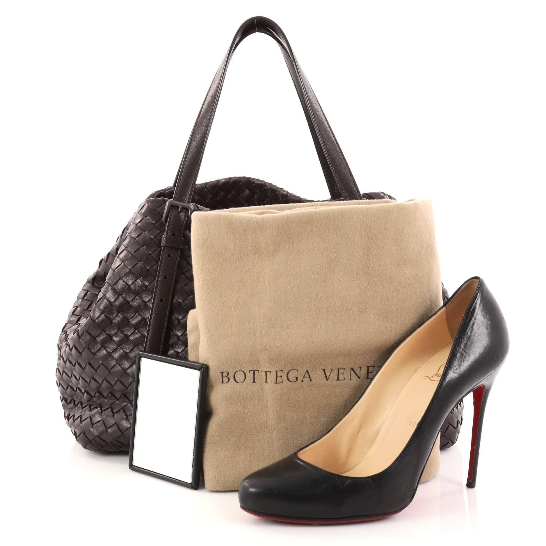 This authentic Bottega Veneta A-Shape Tote Intrecciato Nappa Medium is a statement piece you can surely take from day to night. Crafted in brown nappa leather woven in Bottega Veneta's signature intrecciato method, this stylish tote features