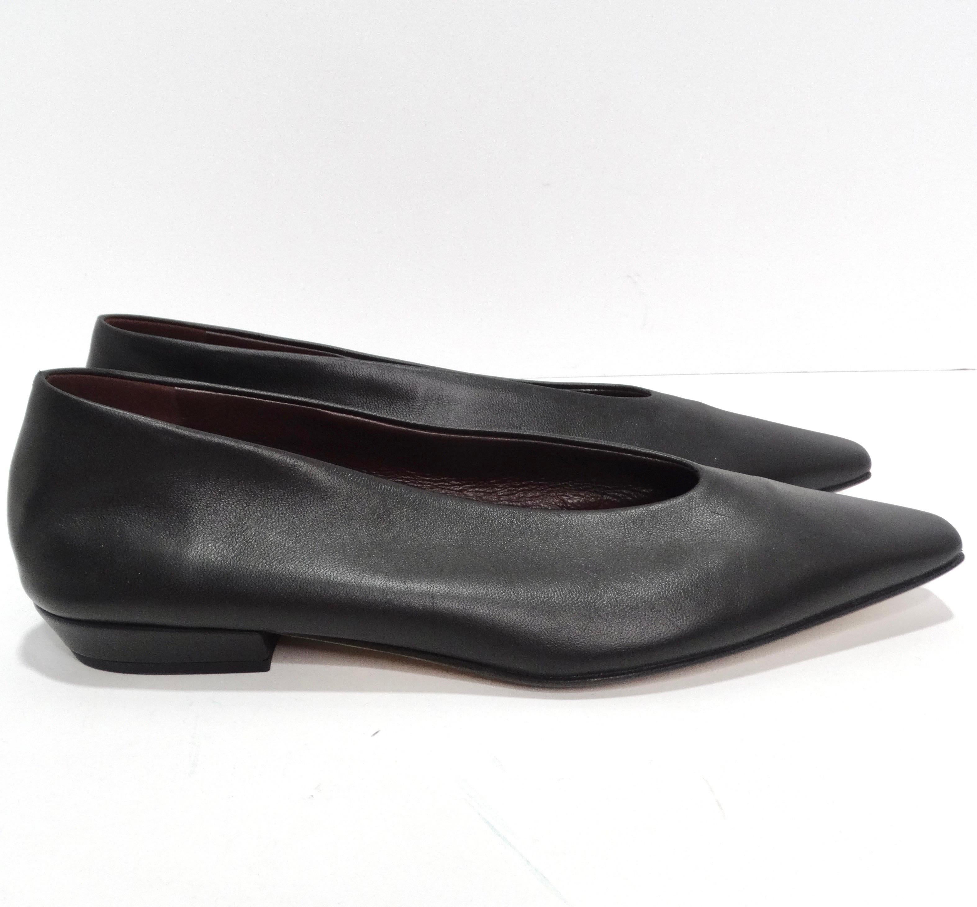 Elevate your footwear collection with timeless elegance and a touch of modern flair – introducing the Bottega Veneta Almond Black Leather Flats.  These classic pointed toe ballet flats are the epitome of chic simplicity. Crafted in beautiful black