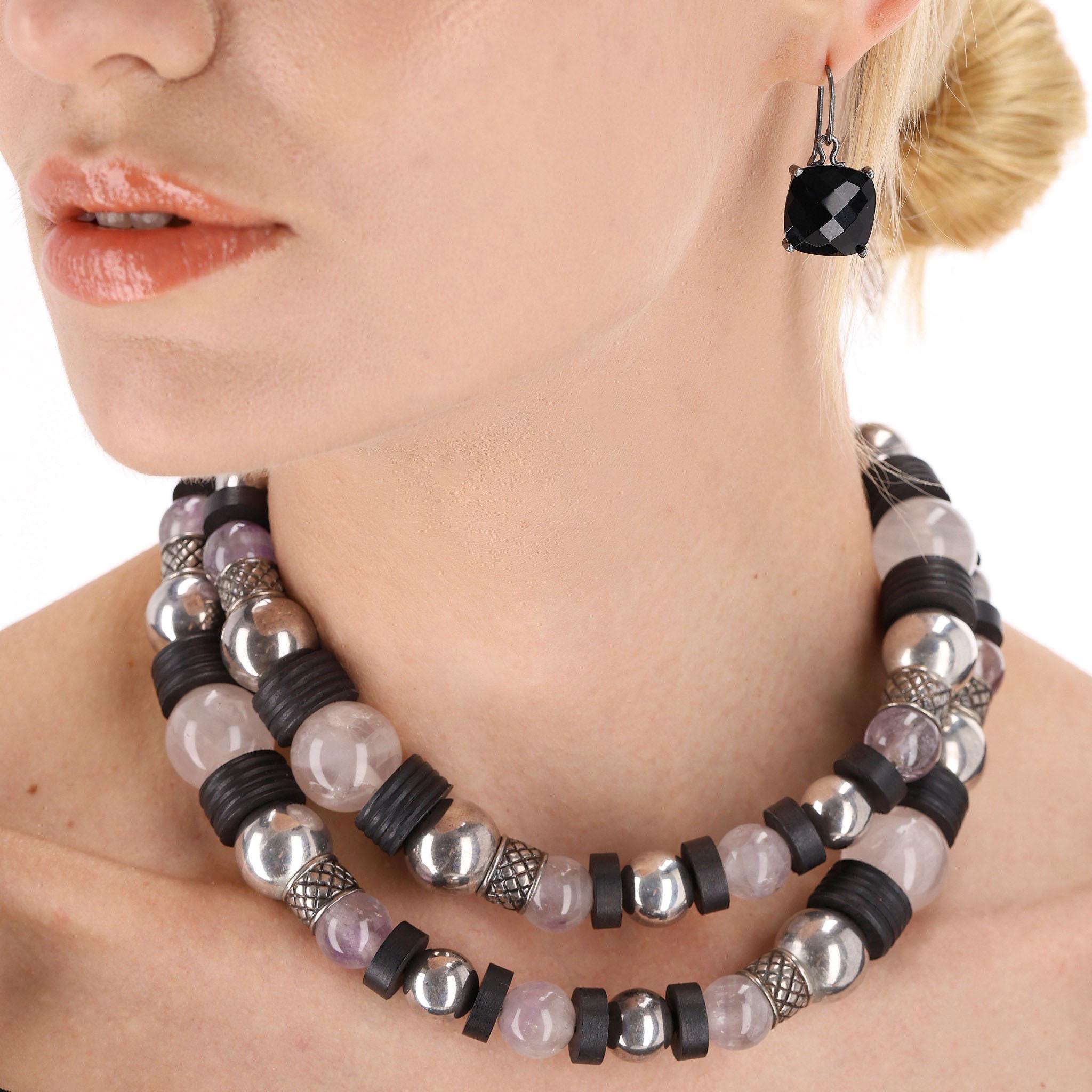 Bottega Veneta Amethyst, Rose Quartz, Sterling Silver & Wood Necklace with Onyx Faceted Drop Earrings

Oversized Beads of mixed semi precious and natural materials with intricate engraving in the iconic Intrecciato detailing.

A single large square