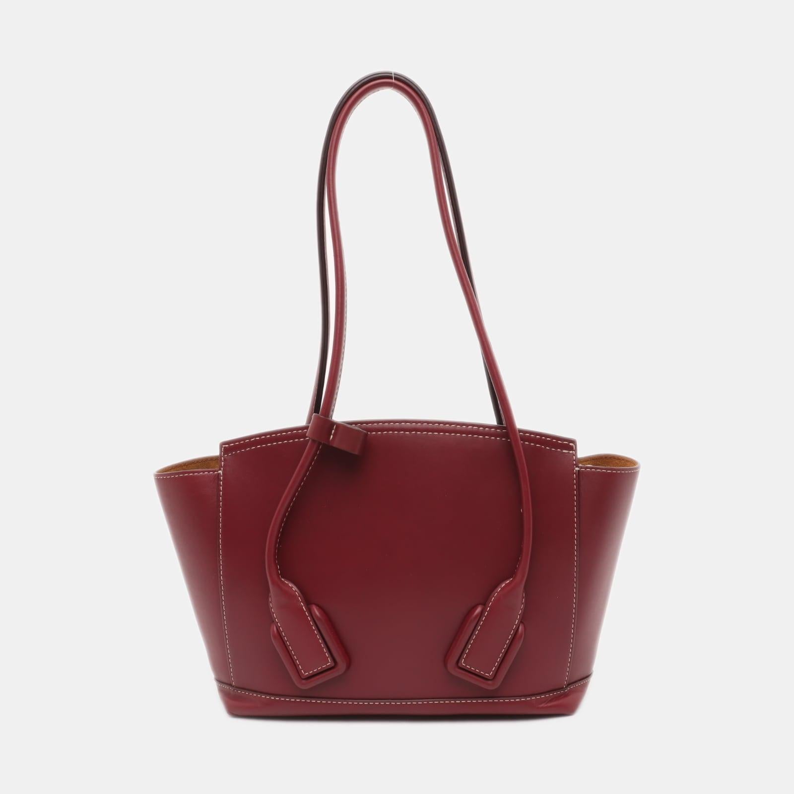 Bottega Veneta Arco Tote Bag Small Burgundy Leather 23cm
 These are professional photos of the actual bag.
 CONDITION: EXCELLENT
 This authentic preloved Bottega Veneta bag is in very good condition with light signs of use. Light scuffs on the