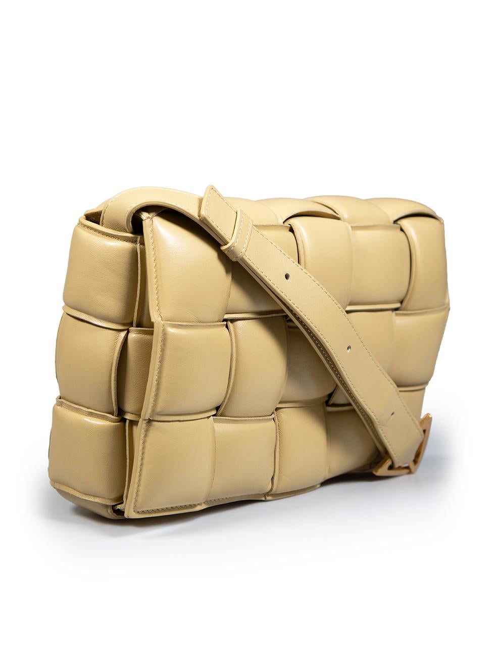CONDITION is Very good. Minimal wear to the bag is evident. Minimal wear to the top, bottom and flap edges is seen with abrasion marks on this used Bottega Veneta designer resale item.
 
 
 
 Details
 
 
 Model: Padded Cassette
 
 Beige
 
 Leather
