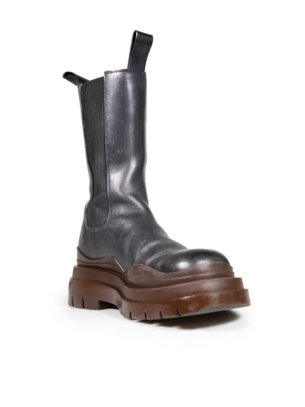 CONDITION is Good. General wear to the boots is evident. Abrasion across the platform rim to both shoes. Scratches and general creasing to the leather on the toe cap, toe box and around the counter. Marks on the elastic gussets to both shoes on this