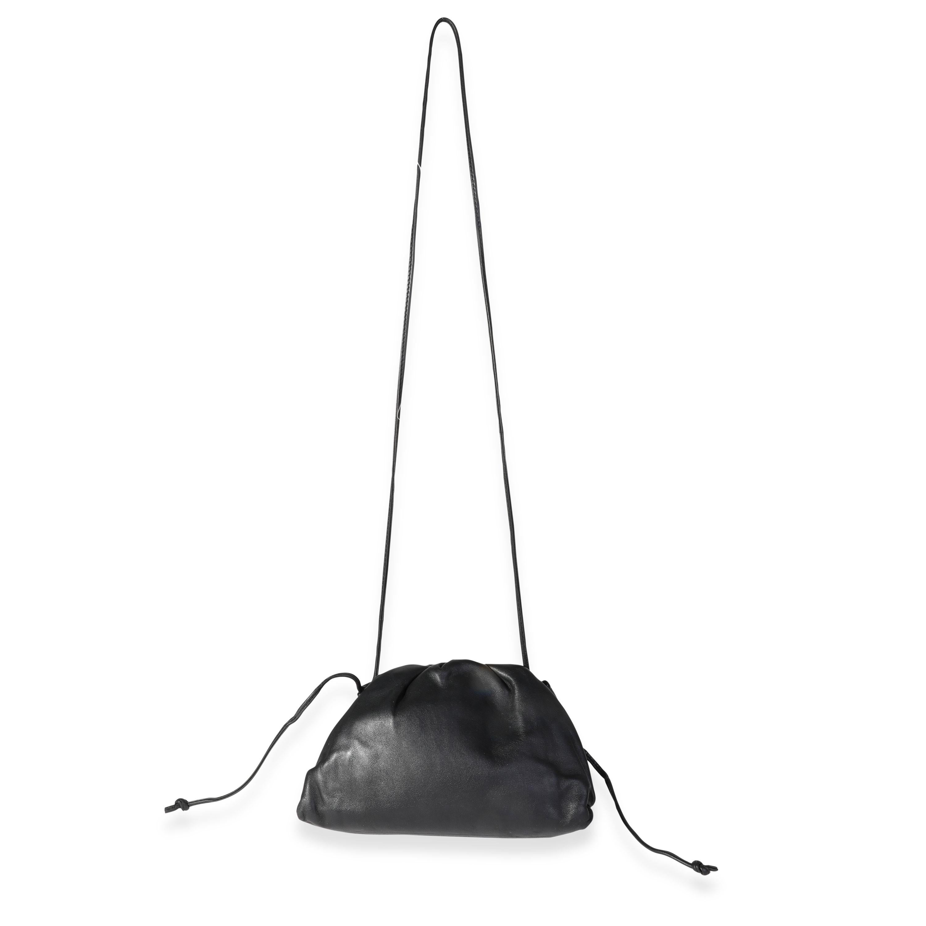 Listing Title: Bottega Veneta Black Calfskin Mini Pouch Bag
SKU: 118346
MSRP: 1850.00 USD
Condition: Pre-owned 
Condition Description: Showcasing Bottega Veneta’s mastery of leather craftsmanship and flair for design, the Pouch line-up is