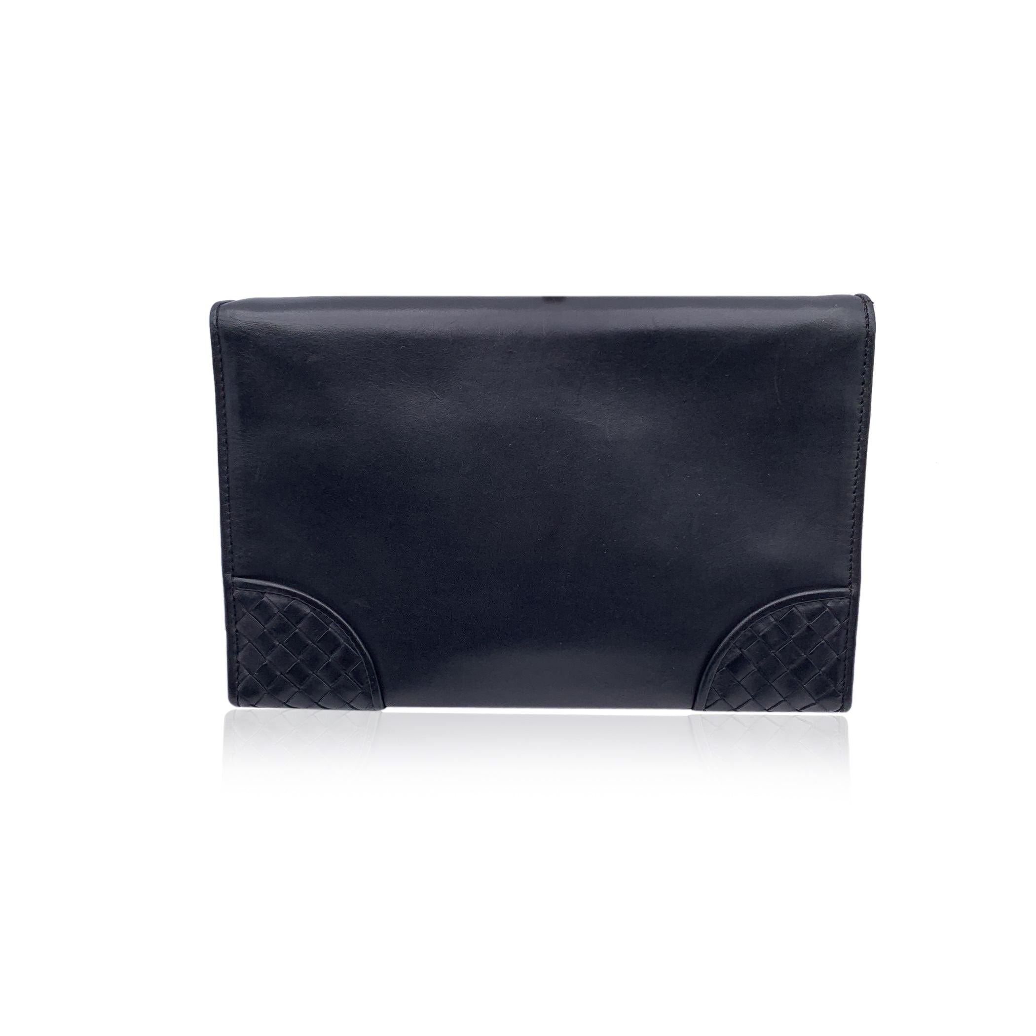 Bottega Veneta Black Intrecciato Leather Slide Lock Clutch Wrist Bag In Good Condition For Sale In Rome, Rome
