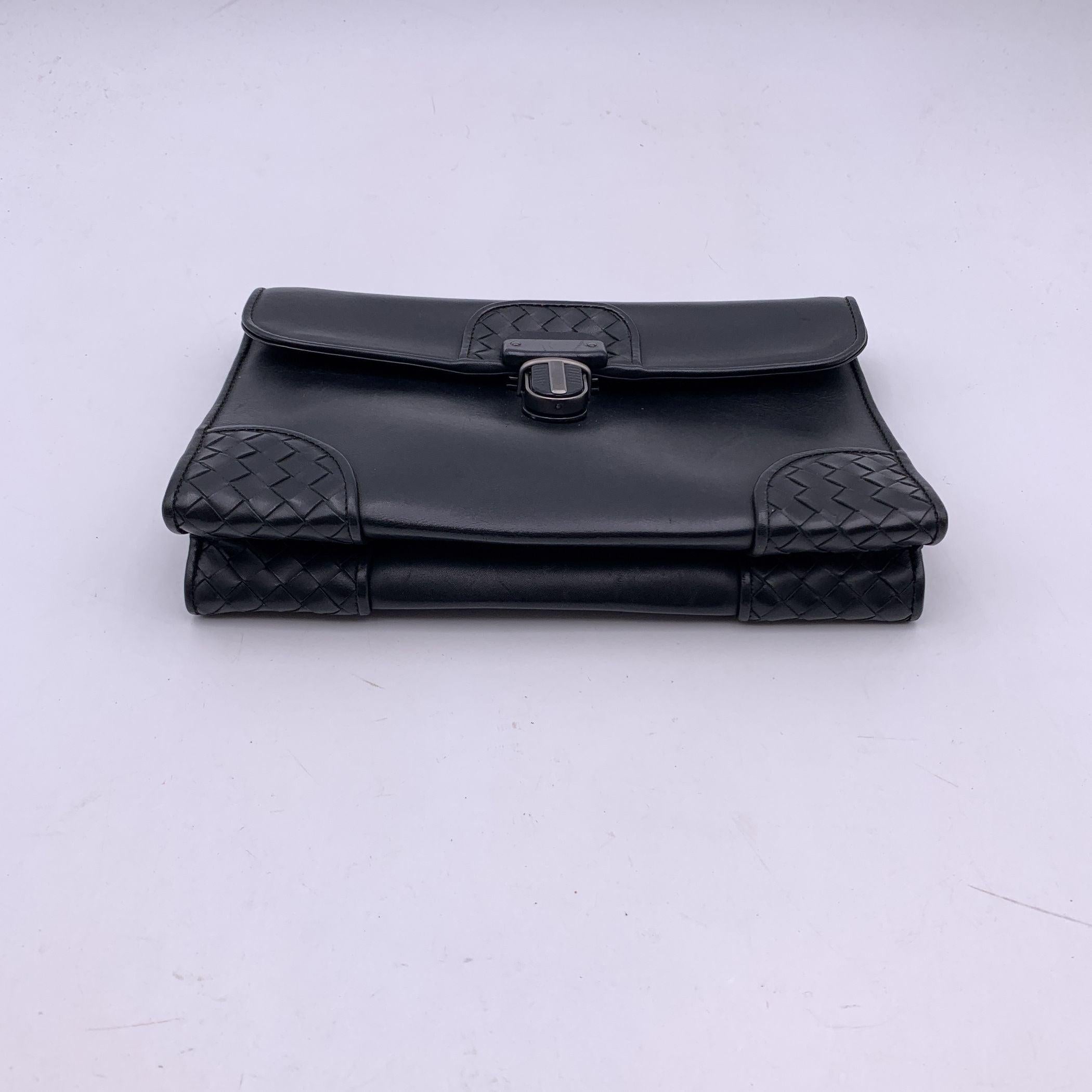 Bottega Veneta Black Intrecciato Leather Slide Lock Clutch Wrist Bag For Sale 1