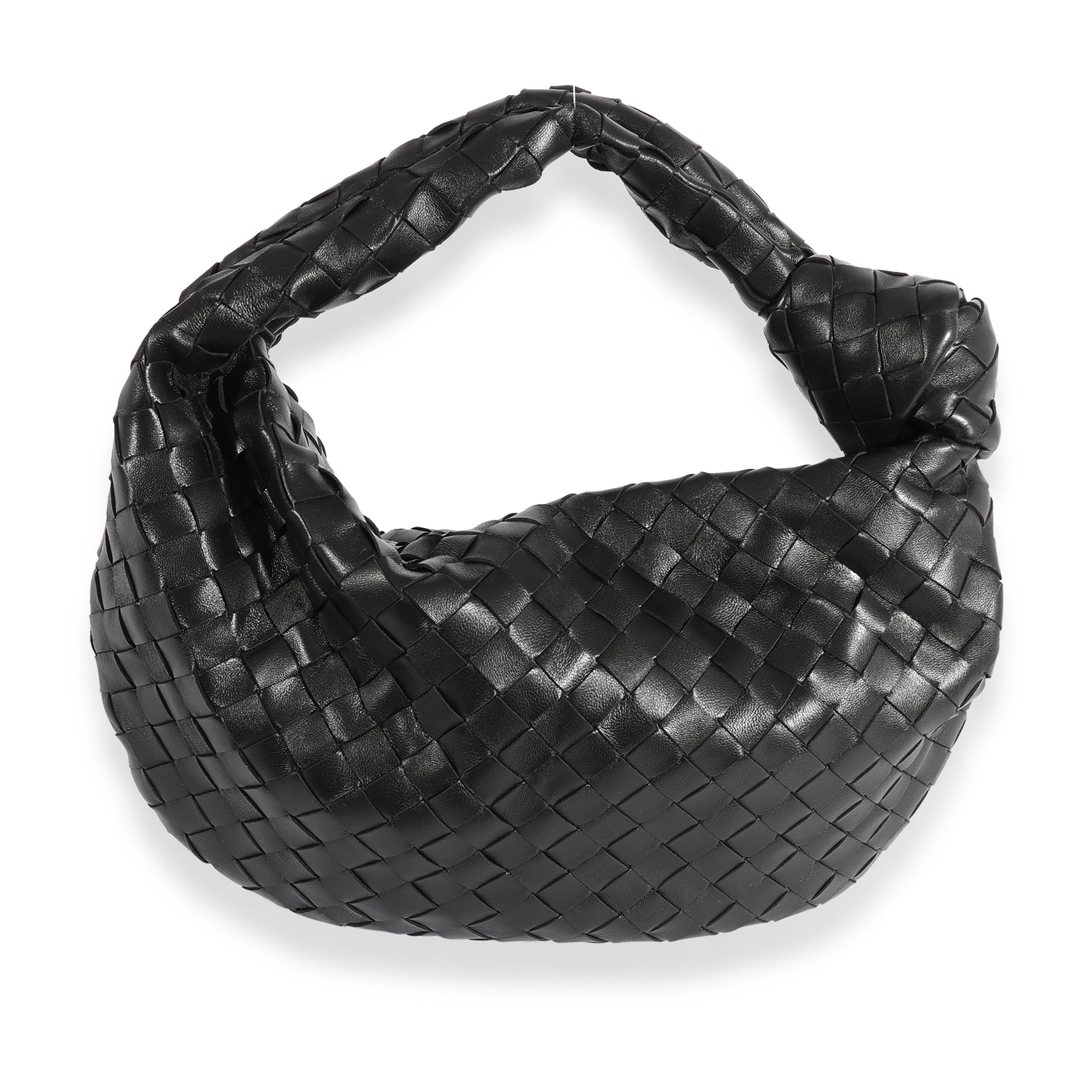 Listing Title: Bottega Veneta Black Intrecciato Leather Teen Jodie
SKU: 123376
MSRP: 3200.00
Condition: Pre-owned 
Handbag Condition: Excellent
Condition Comments: Excellent Condition. Light scratching to hardware. No other visible signs of