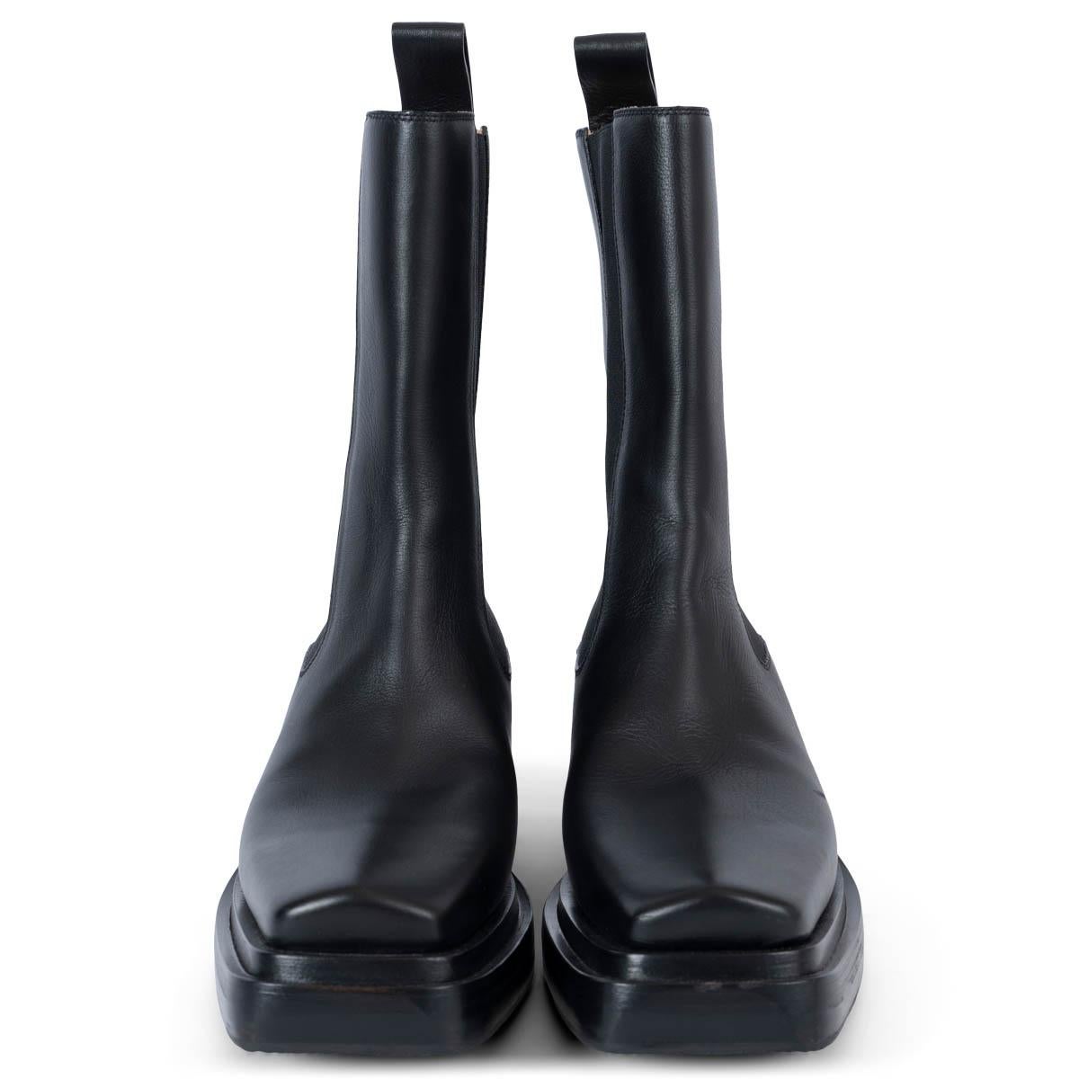 100% authentic Bottega Veneta Lean cowboy boots in smooth black calfskin featuring square toe, elasticated ankles, pull-tab at the heel, calf-length and mid stacked heel. Brand new. Black rubber soles have been added. Come with dust bag. 

2020