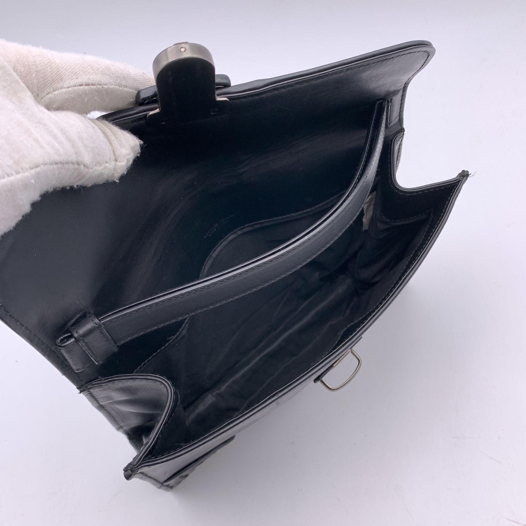 Bottega Veneta, pelle nera Intrecciato, Pochette da polso con chiusura a scorrimento In condizioni buone in vendita a Rome, Rome