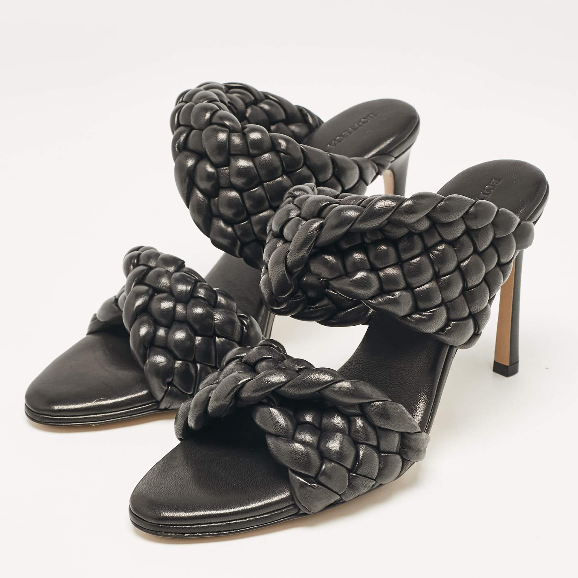 We love how these Bottega Veneta sandals can complement any outfit effortlessly. They feature woven leather straps  open toes  and stiletto heels.