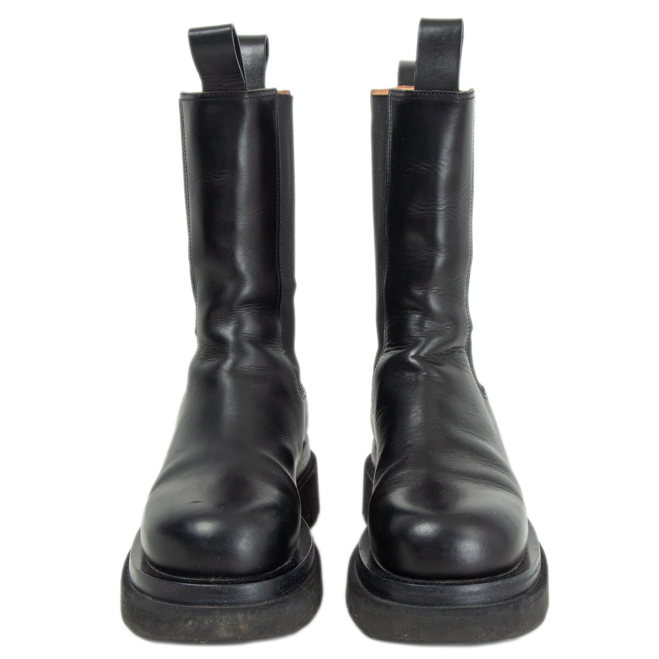 100% authentic Bottega Veneta Lug mid-calf boots in black calfskin uppers set on lugged rubber soles. Elasticated side panels with tonal pull tabs. Have been worn and are in excellent condition. Come with dust bags. 

Measurements
Imprinted