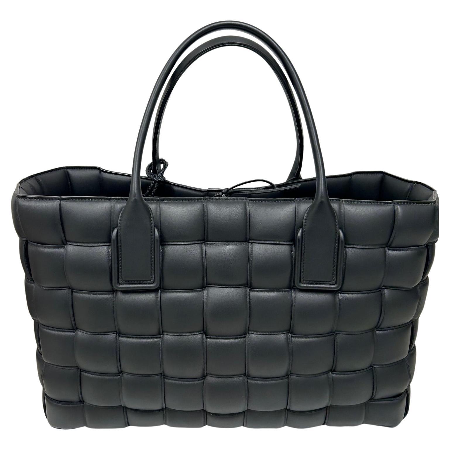 - Bottega Veneta Black Padded Cabat (Lambskin) limited edition
- Brand New never used from 2019 collection
- Includes key fob and cosmetic case
- Large Tote that can be carried for day or as an overnight bag
- Designed by Daniel Lee
- Handcrafted