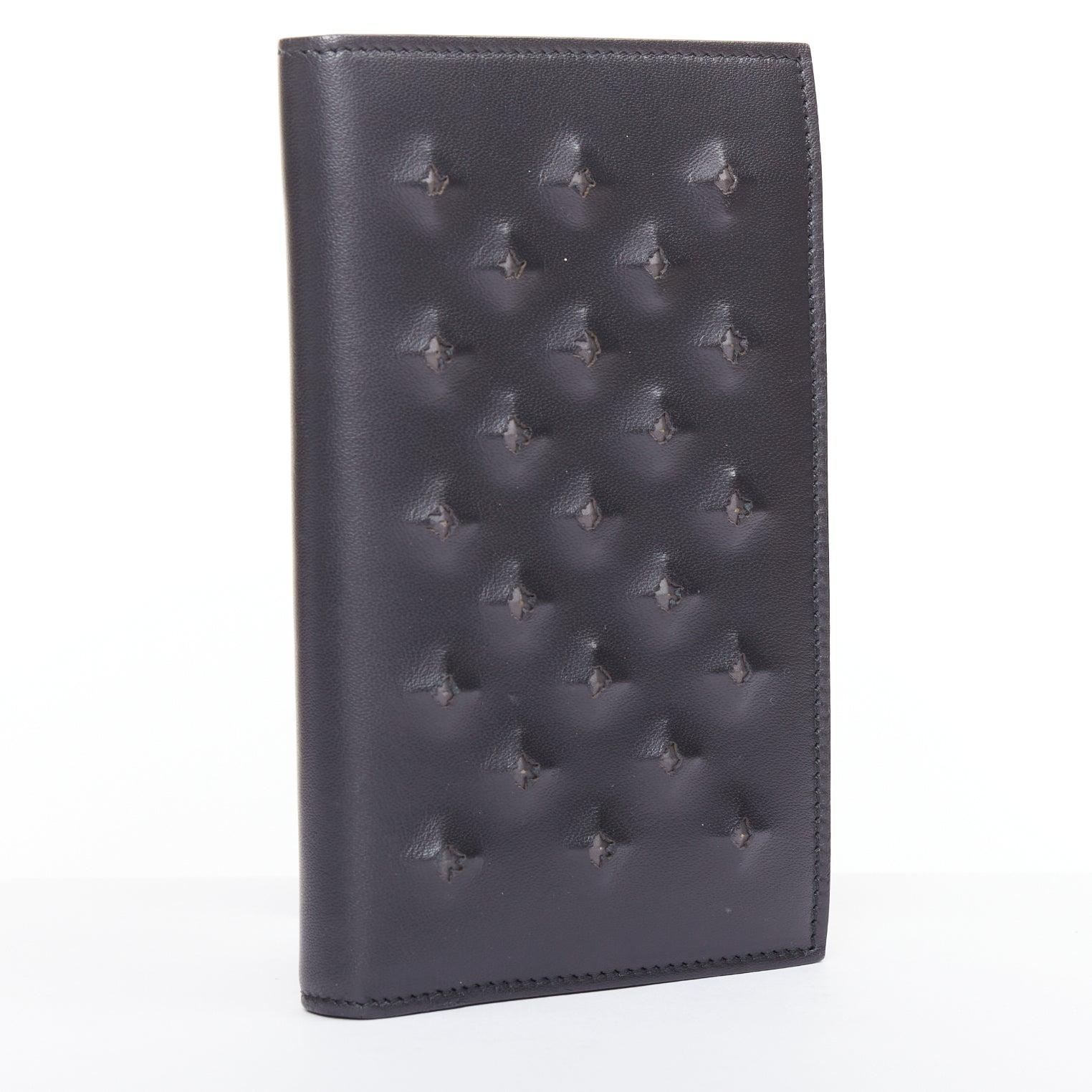Nero BOTTEGA VENETA black pierced stud details rectangular bifold purse wallet in vendita
