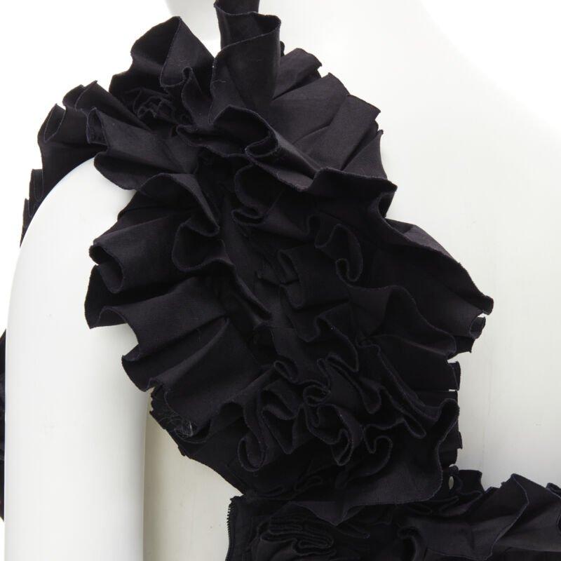 BOTTEGA VENETA schwarzes plissiertes Rüschen-Bustier-Top mit einer Schulterkorsett IT38 XS
Referenz: TGAS/B02041
Marke: Bottega Veneta
Designer: Tomas Maier
MATERIAL: Baumwolle
Farbe: Schwarz
Muster: Solide
Verschluss: Reißverschluss
Zusätzliche