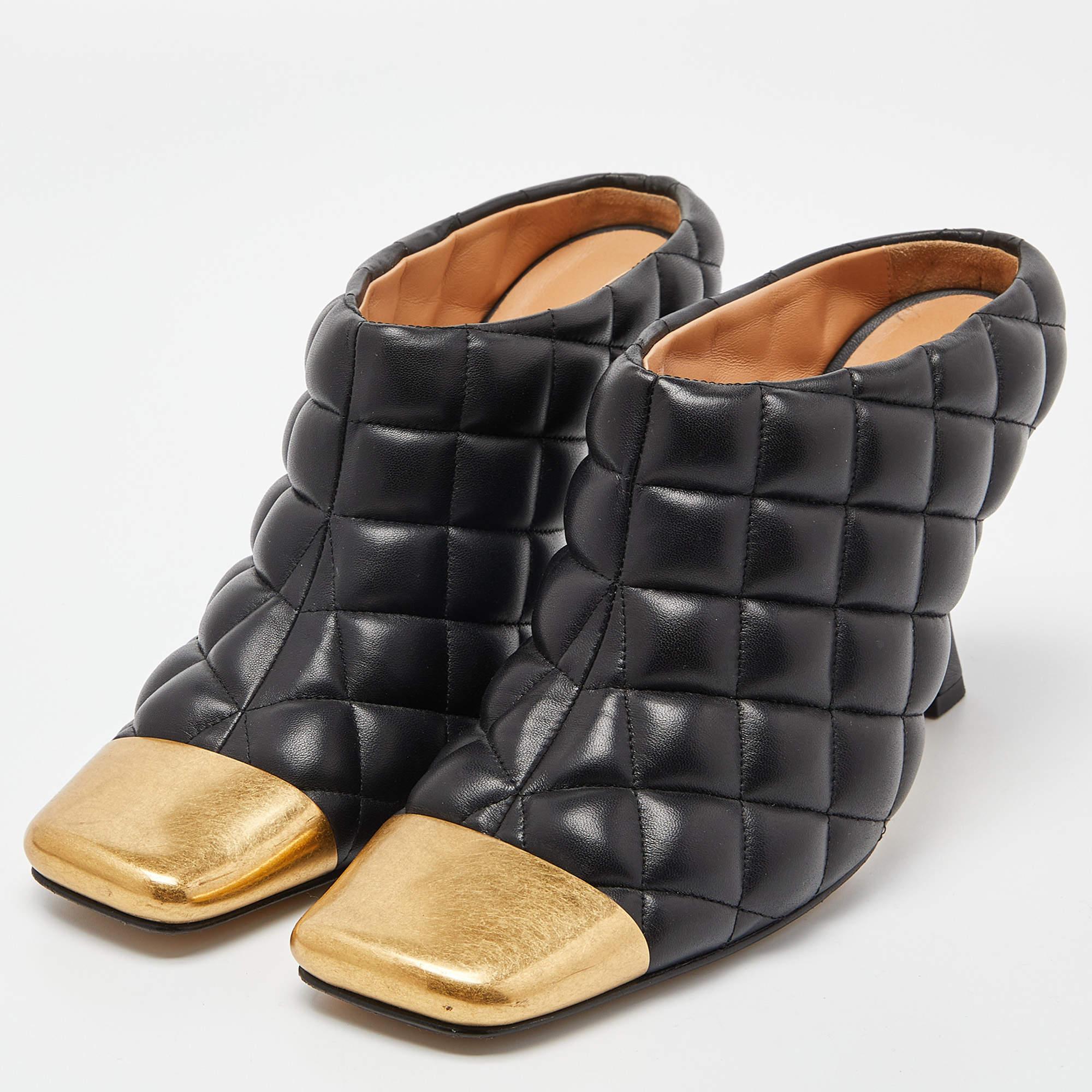 Deliver statement looks with these mules from Bottega Veneta! From their shape and detailing to their overall appeal, they exude elegance. The mules feature a padded leather construction with gold-tone cap toes and 9 cm heels.

