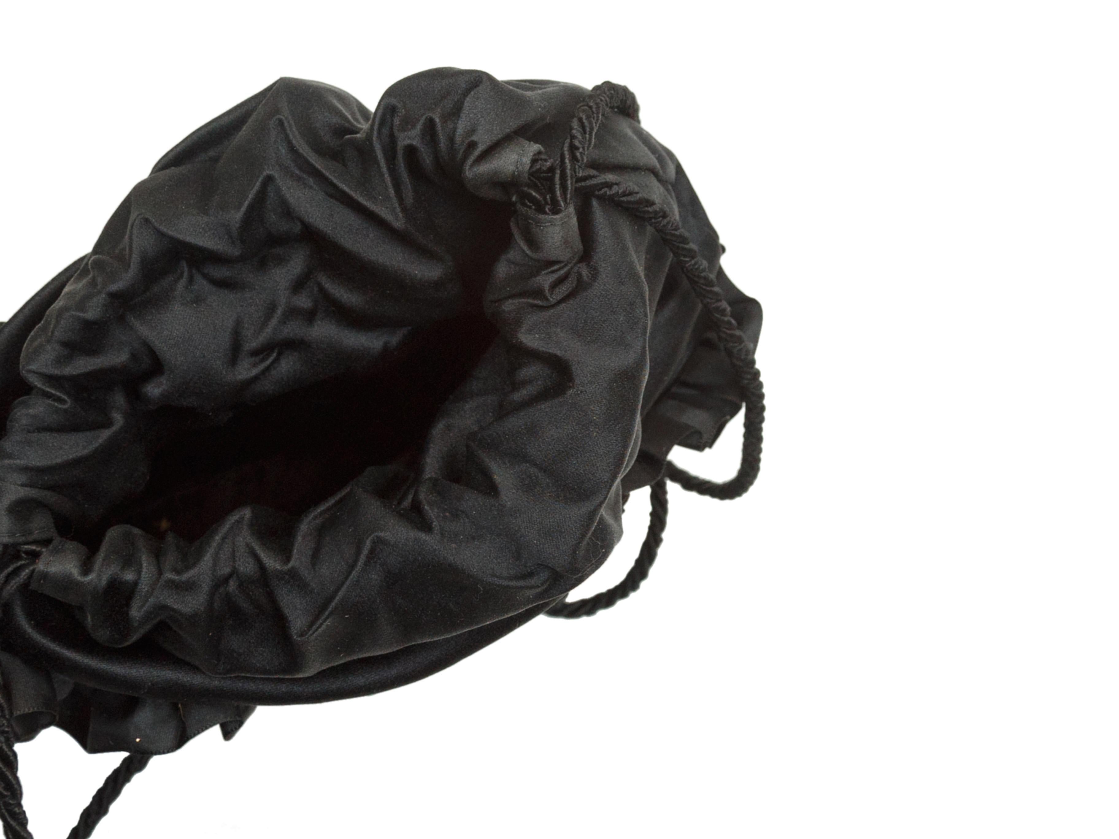 Product details: Vintage black Intrecciato satin bucket bag by Bottega Veneta. Drawstring pull closure at top. 6.75