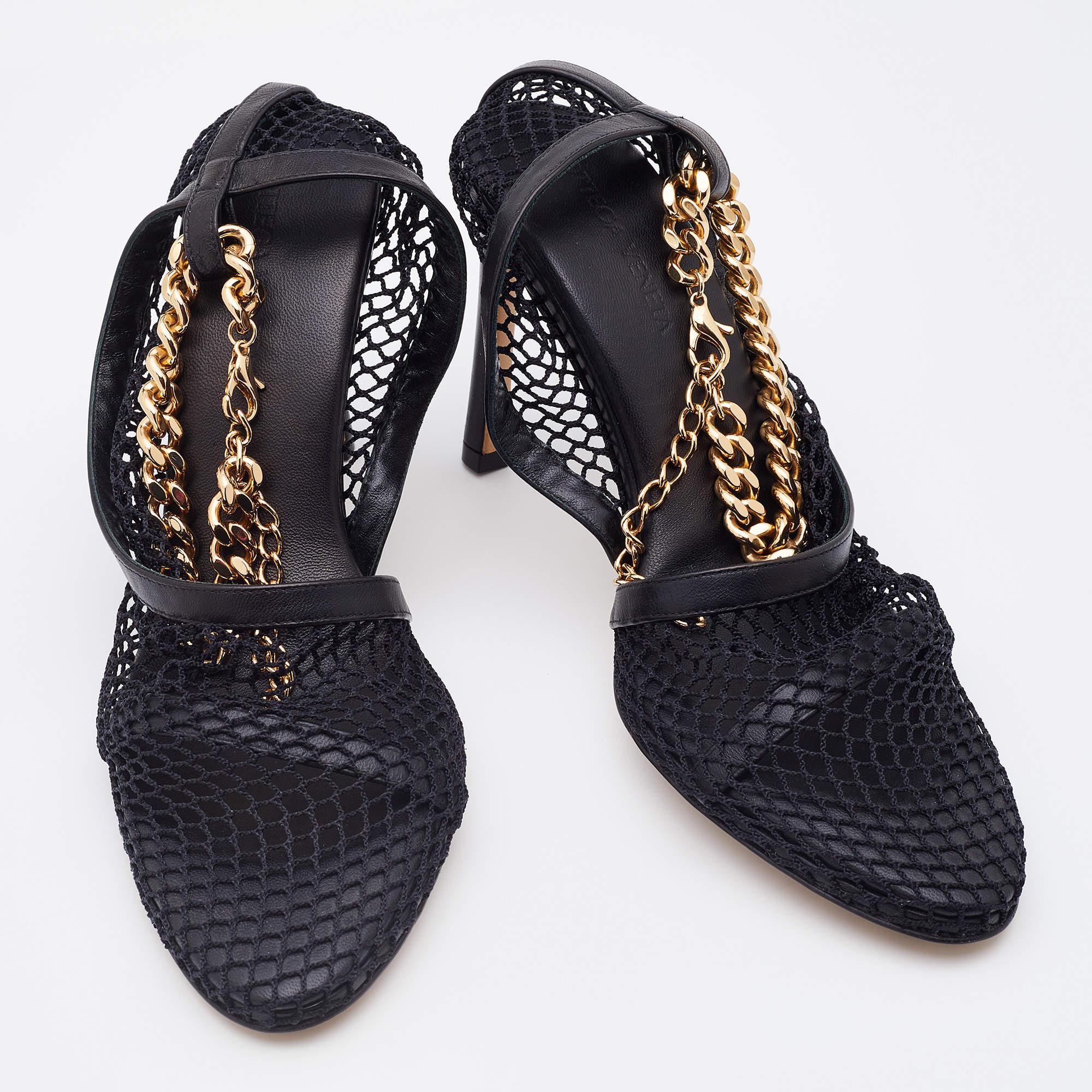 Bottega Veneta brings you this beautifully crafted pair of sandals for a fashionable look. It has an absolutely sophisticated exterior in mesh with a gold-tone chain trim.

Includes: Original Box, Original Dust bag, Info Booklet, Extra Heel Tips