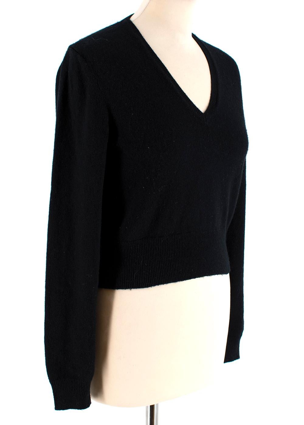 Bottega Veneta Black V-Neck Jumper

- Lightweight knit
- V-neck, long sleeves
- Ribbed knit neckline, cuffs, and hem
- Cropped length

Materials:
100% Cashmere

Made in Italy
Dry Clean only

Measurements:
Measurements are taken laying flat, seam to
