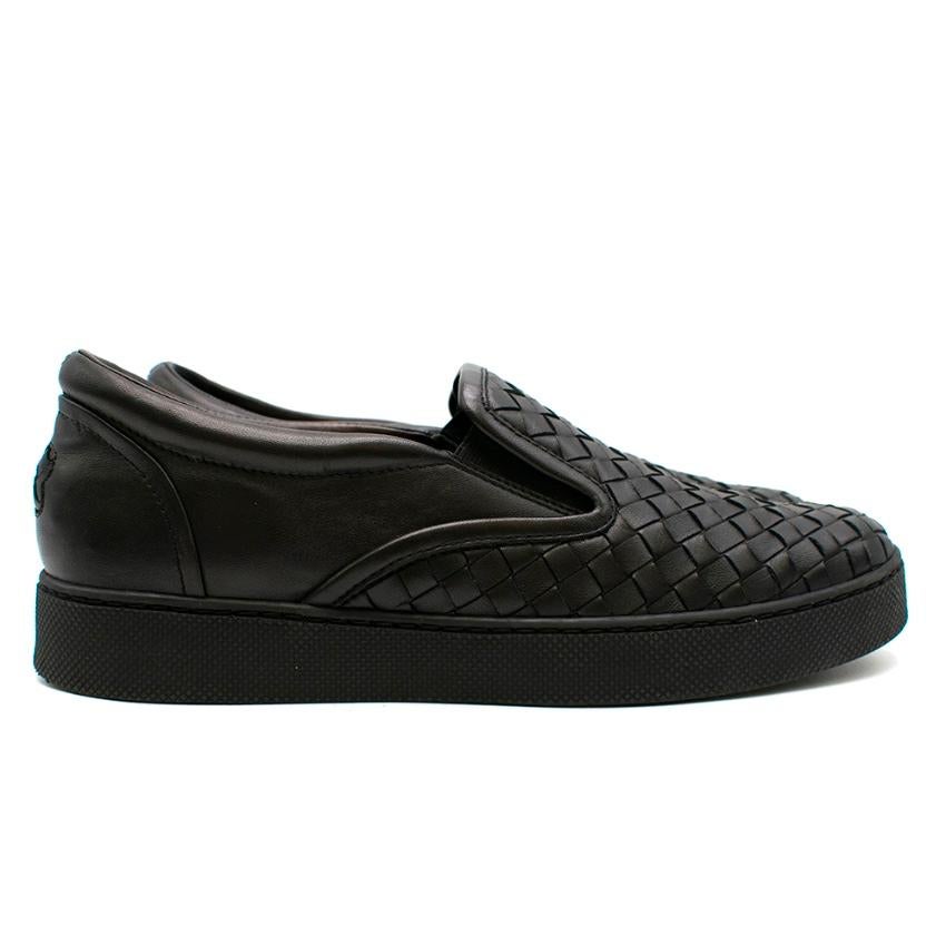 Bottega Veneta Black Woven Leather Sneakers

- Rounded toe 
- Slide on 
- Black Woven Leather Outer 
- Small Platform 
- Woven Cross to heel 
- Size Not labeled please refer to measurements 

Materials 
100% Leather 

Made in Italy 

No size labeled