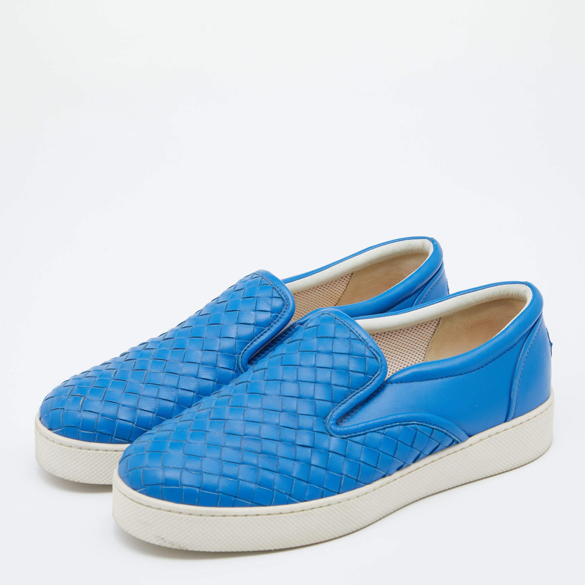 Sneakers are the best way to experience total comfort and luxury, and these sneakers from the House of Bottega Veneta will give you just that! They are crafted from blue Intrecciato leather on the exterior and showcase an easy slip-on feature. Add