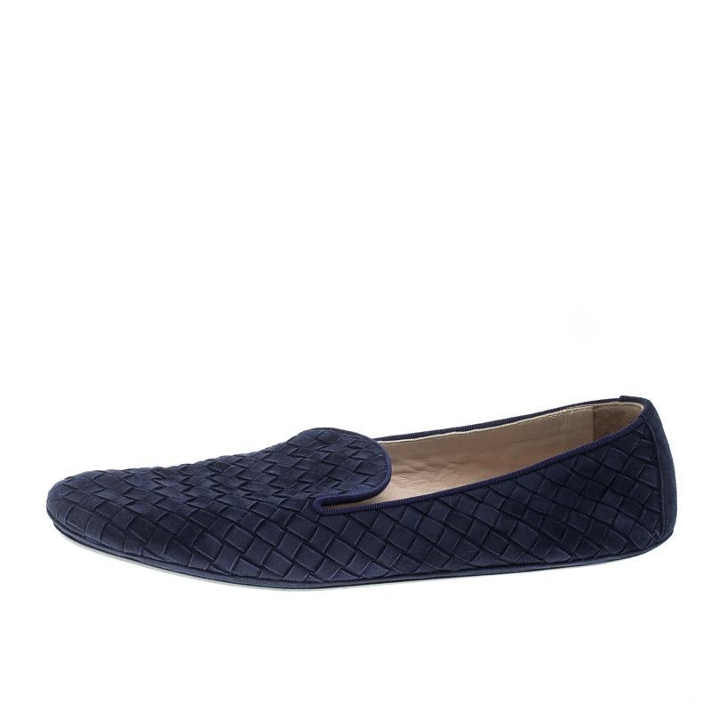 For a laidback yet stylish ensemble pick these this pair of Smoking slippers from Bottega Veneta that speak nothing but comfort and fabulous design. They've been crafted with blue suede and is decorated with signature Intrecciato pattern all over.