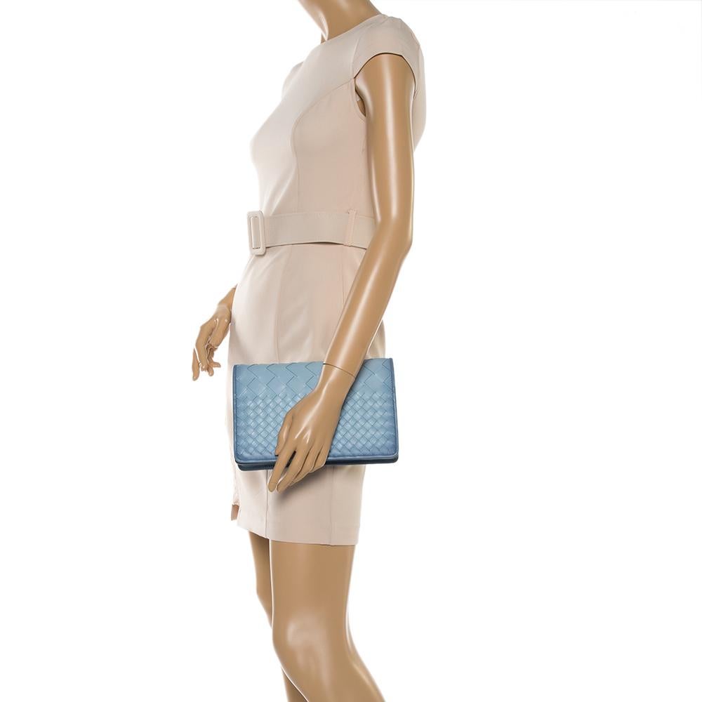 Bottega Veneta builds on its collection of intrecciato accessories with the new Montebello clutch. Arriving in a blue ombré hue, it is constructed from leather. It's perfect for accenting everything from sleek tailoring to eveningwear.

Includes: