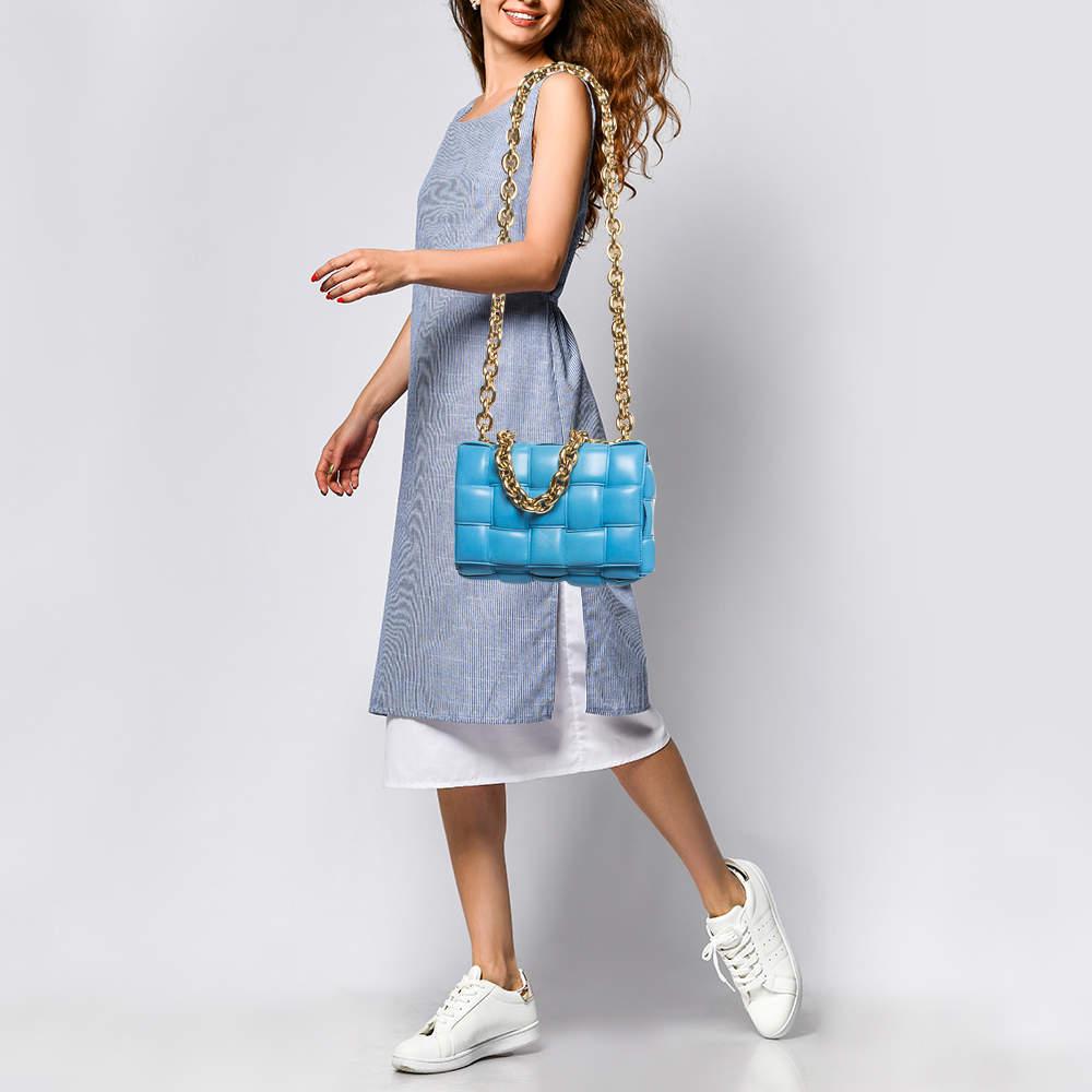 The current bag on many fashionistas' minds is this Cassette bag from the house of Bottega Veneta. We have here the one in blue leather, flaunting a padded maxi weave and a shoulder strap. The insides are sized to fit your phone and other little