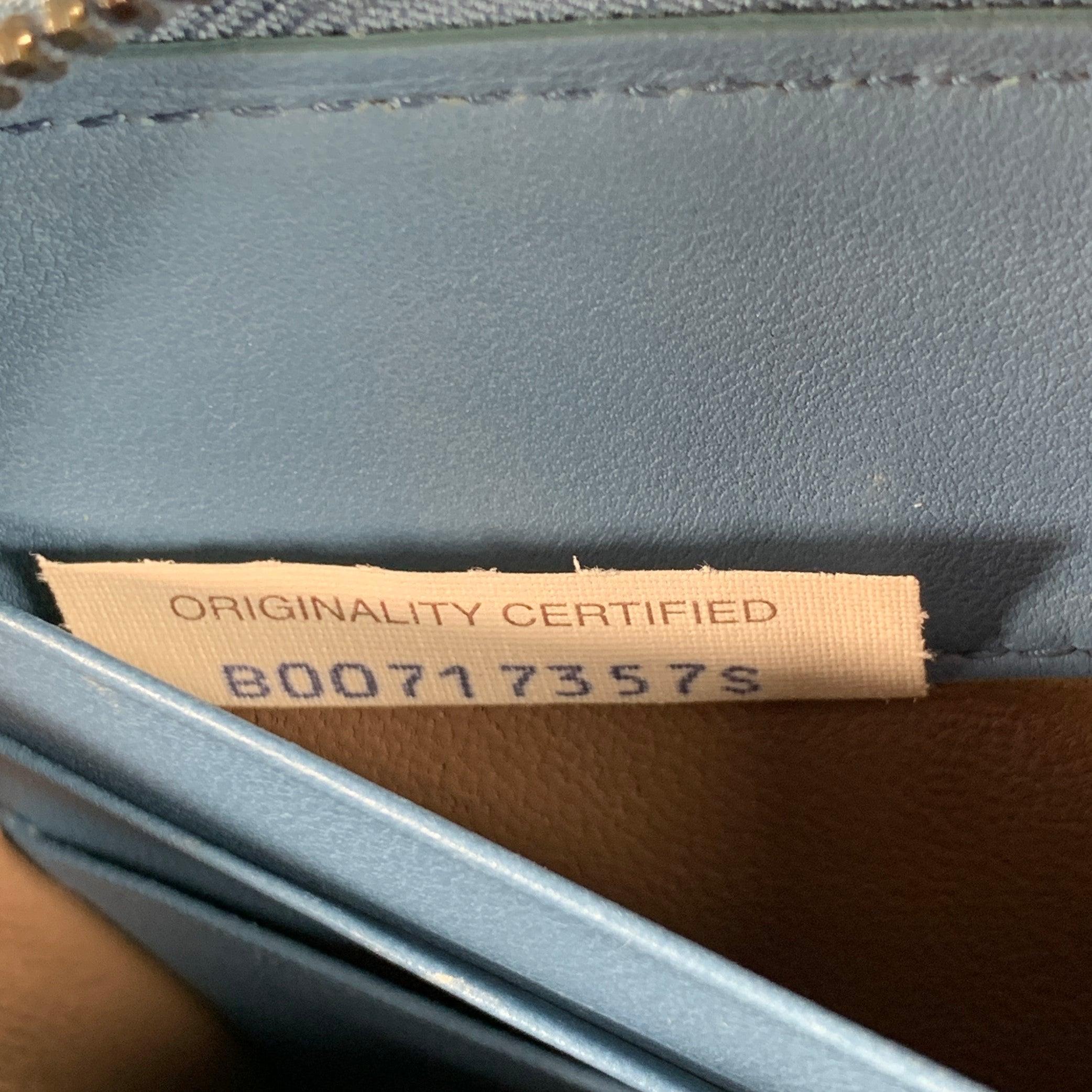 Portefeuille de chèques à fermeture éclair en cuir tressé bleu de BOTTEGA VENETA en vente 3