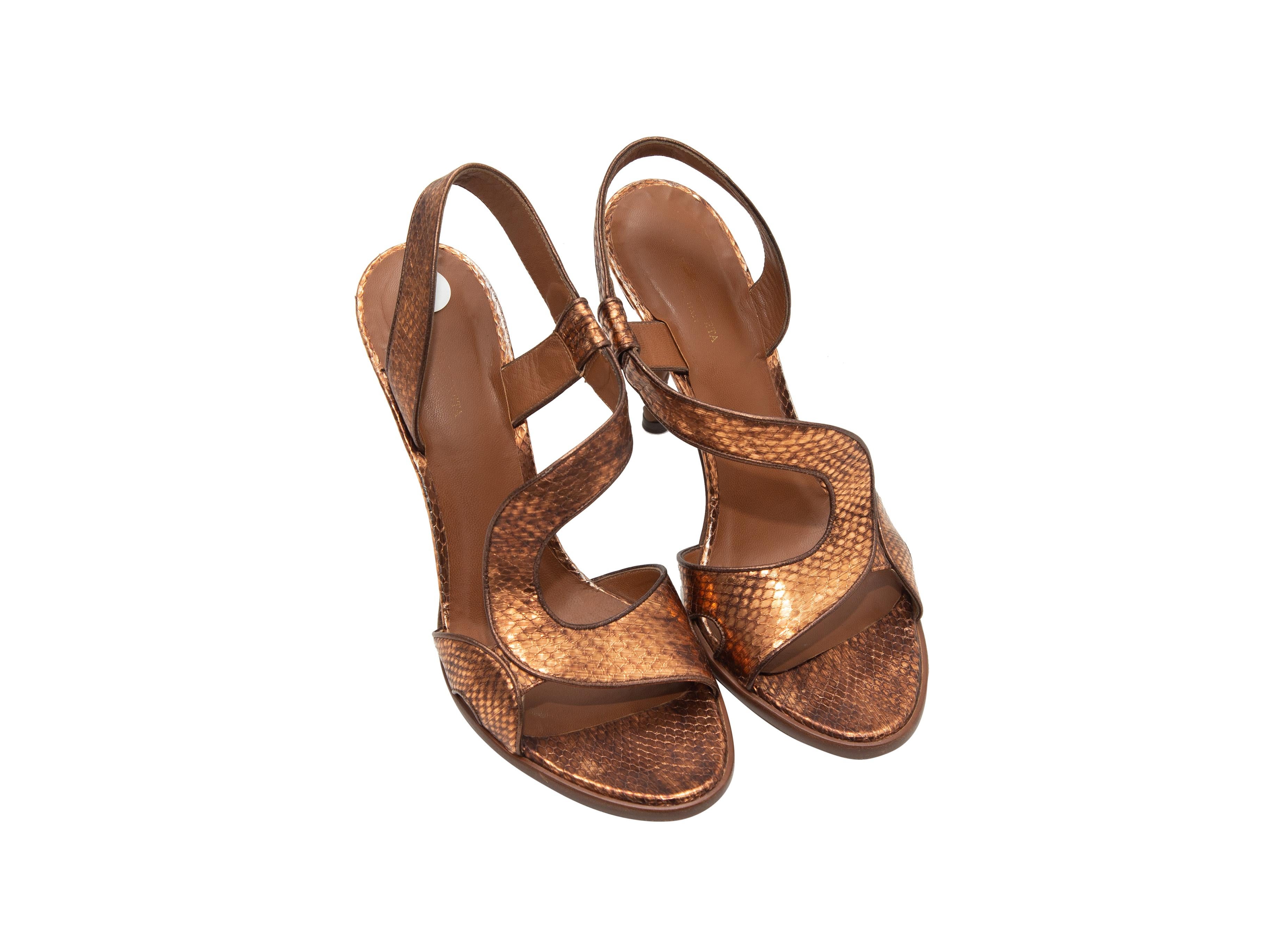 Product details: Bronze metallic embossed leather heeled sandals by Bottega Veneta. Brown Intrecciato leather heels. Designer size 39. 4.5
