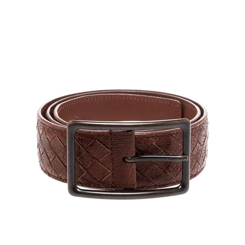 Give your outfit a stylish touch with this Bottega Veneta belt. Made from Intrecciato woven leather, its brown color is contrasted with black-tone eyelets and buckle.

Includes: Original Dustbag

