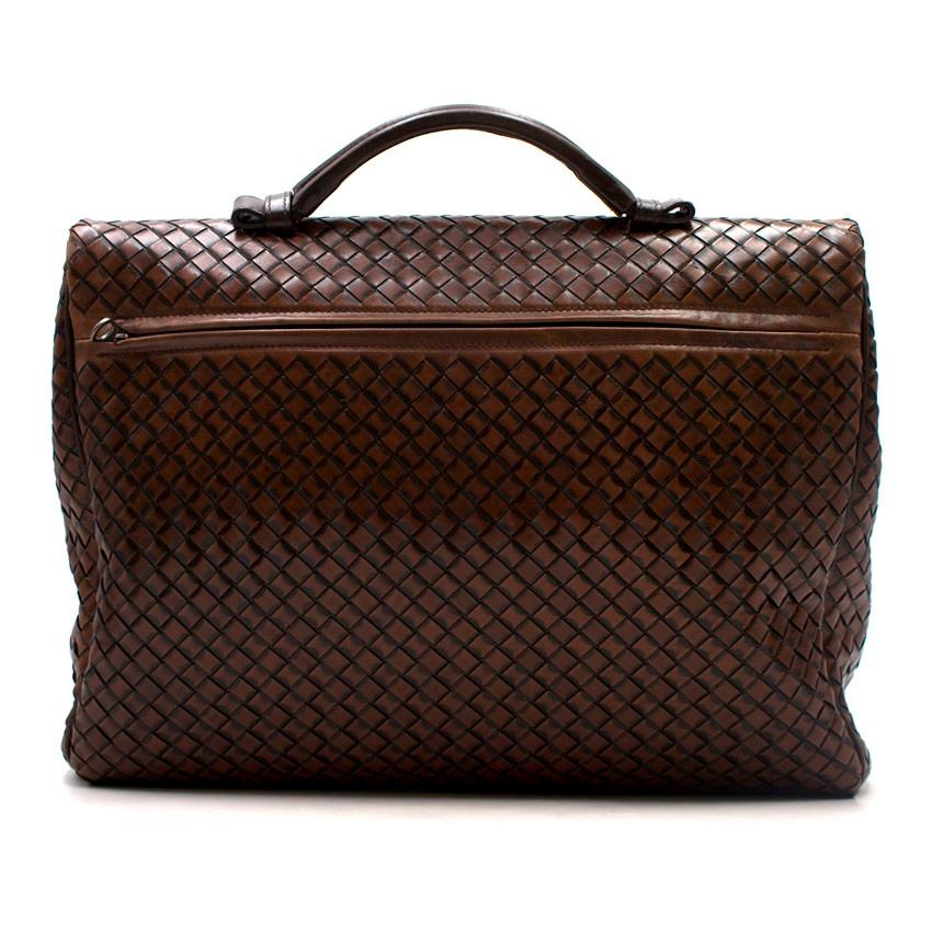 Bottega Veneta Brown Intrecciato Briefcase

-Round top handle
-Fold-over top flat
-Gunmetal-tone hardware
-Hidden zipper pocket to the exterior of the bag
-Divider to the interior of the bag

Please note, these items are pre-owned and may show signs