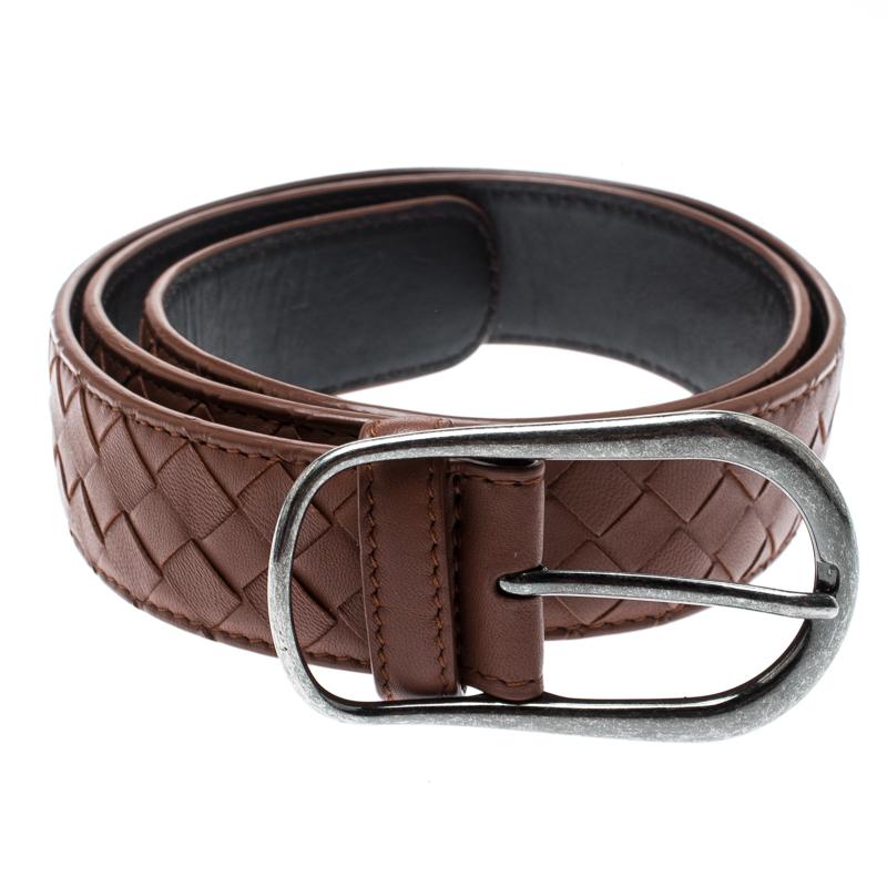 Give your outfit a bold and stylish touch with this Bottega Veneta belt. Made from Intrecciato woven leather, its brown color is contrasted with dark black-tone eyelets and buckle.

Includes: The Luxury Closet Packaging

