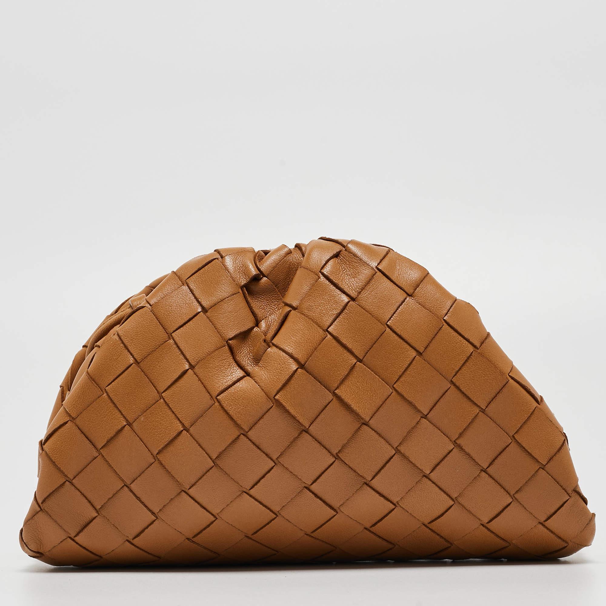 Elevate your style with this Bottega Veneta bag. Merging form and function, this exquisite accessory epitomizes sophistication, ensuring you stand out with elegance and practicality by your side.

Includes: Original Box, Info Booklet

