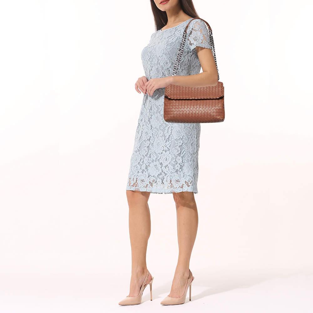For a look that is complete with style, taste, and a touch of luxe, this designer bag is the perfect addition. Flaunt this beauty on your shoulder and revel in the taste of luxury it leaves you with.

Includes: Pocket Mirror