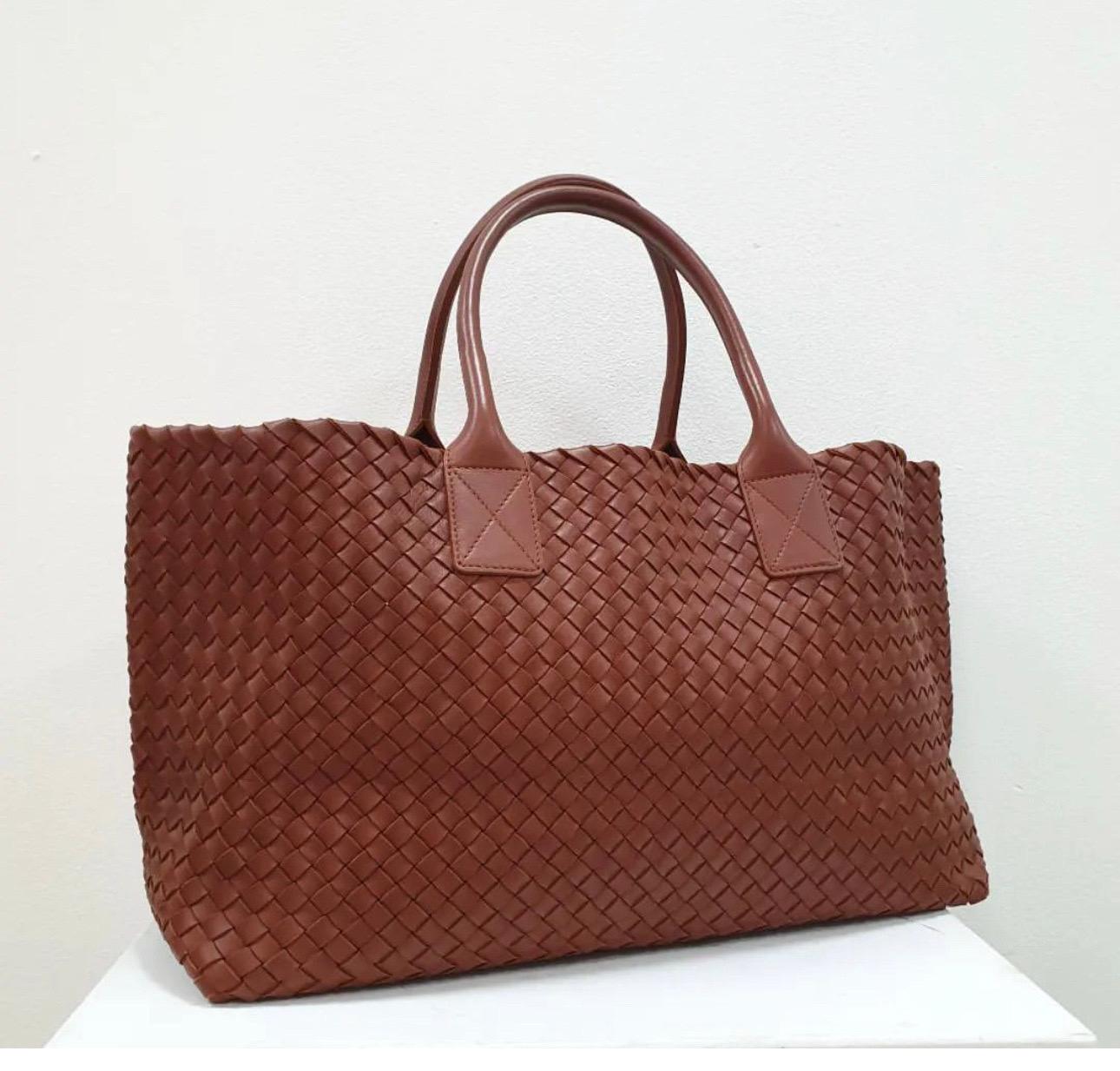 Gorgeous and rare Bottega Veneta  Cabat Tote Bag. 
Made in limited quantities, this bag is entirely hand woven inside and out. 
The chic and slouchy look features Bottega's signature woven leather with more than enough room to fit all of your daily