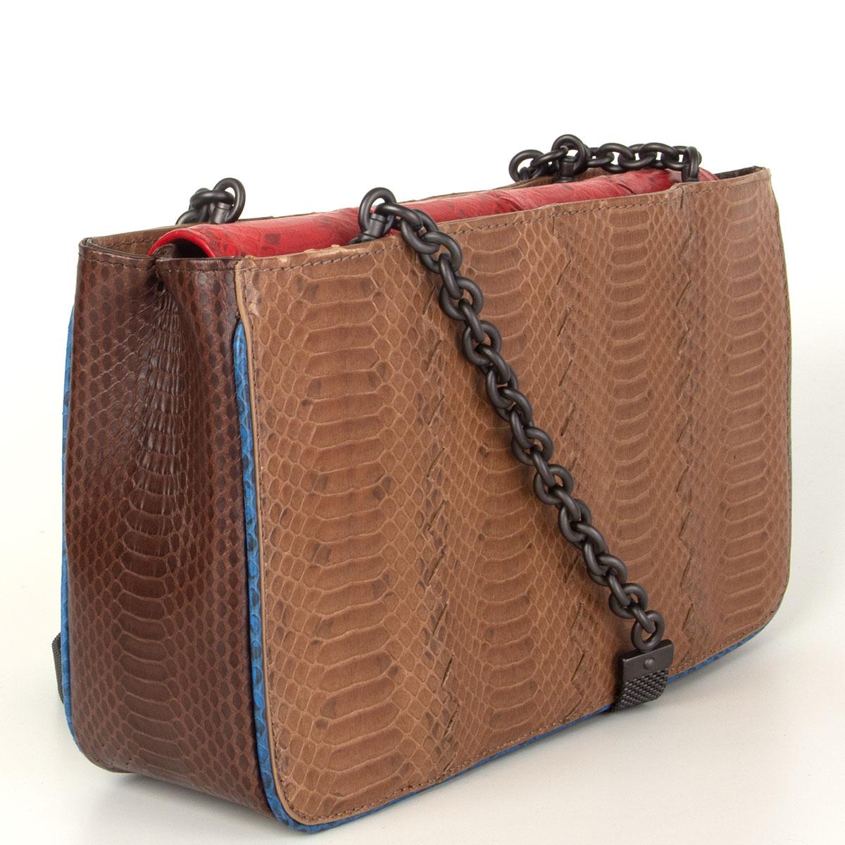 Bottega Veneta shoulder bag in brown, dark brown and red snakeskin featuring blue trim. Can be worn as a shoulder bag , clutch or crossbody bag. Opens with a magnetic flap and is lined in taupe suede. Has been carried and is in excellent condition.
