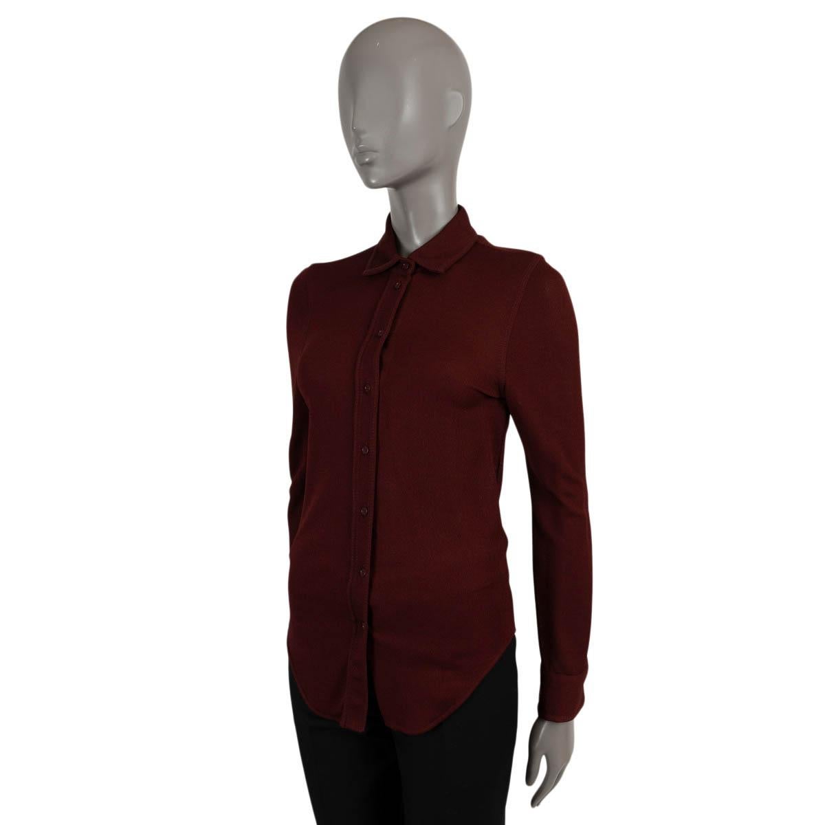 100% authentic Bottega Veneta button-up shirt in Merlot (burgundy) viscose jersey (100%). Features a curved bottom hem and buttoned cuffs. Closes with buttons on the front. Has been worn and is in excellent condition.

2019